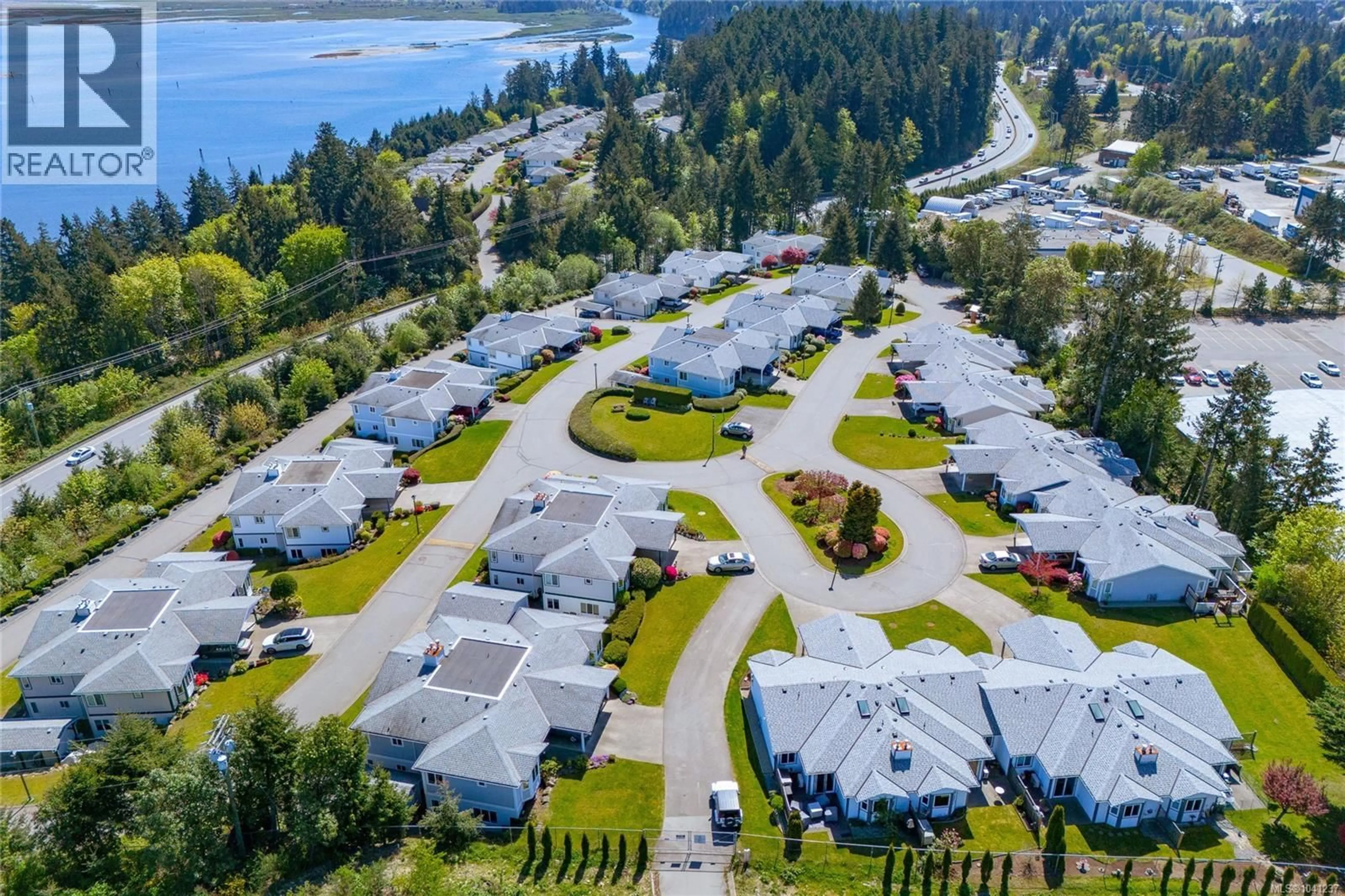 A pic from outside/outdoor area/front of a property/back of a property/a pic from drone, water/lake/river/ocean view for 366 PETROGLYPH CRESCENT, Nanaimo British Columbia V9R5K1