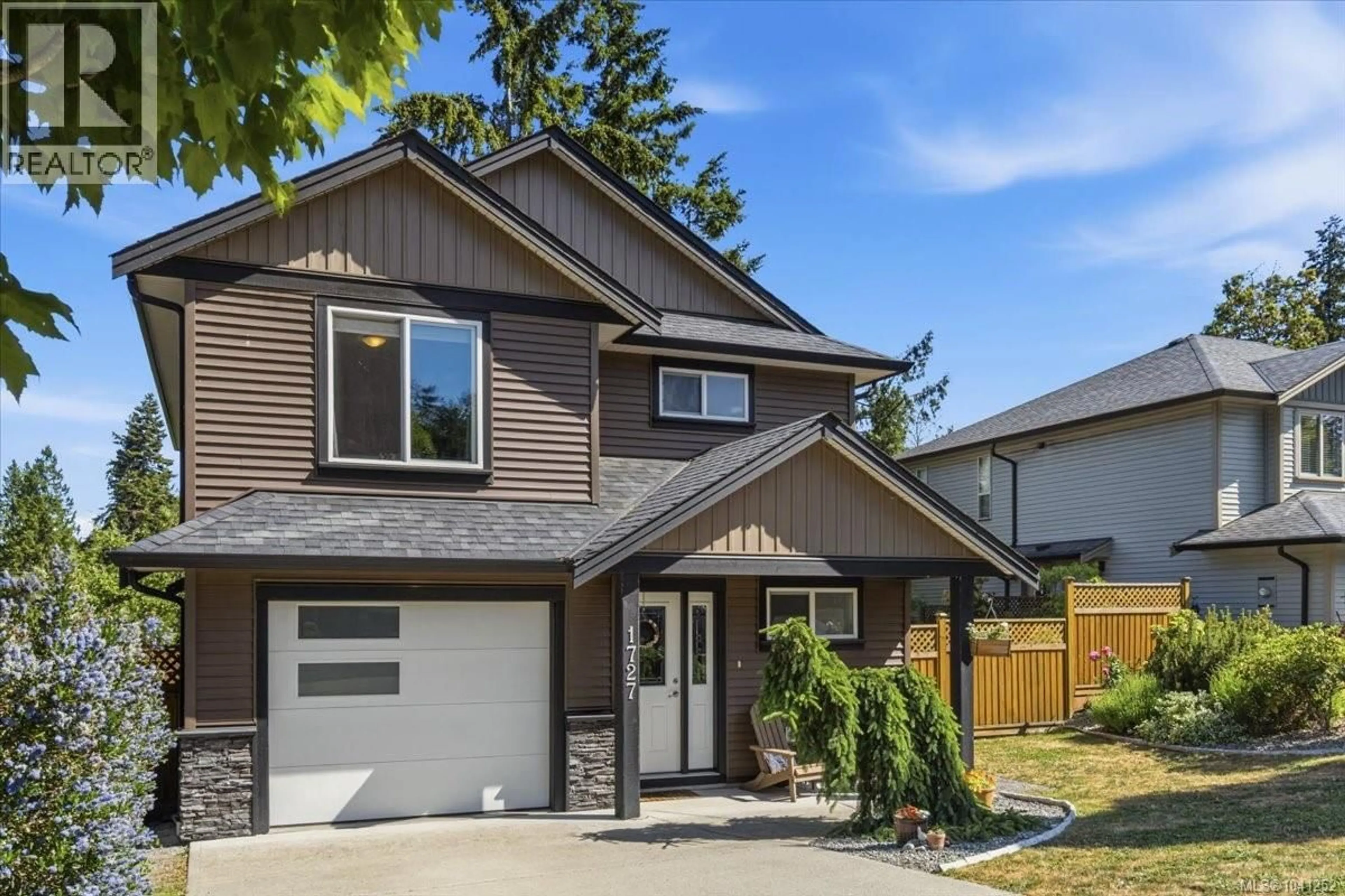 Home with vinyl exterior material, street for 1727 TREVORS ROAD, Nanaimo British Columbia V9X0A8