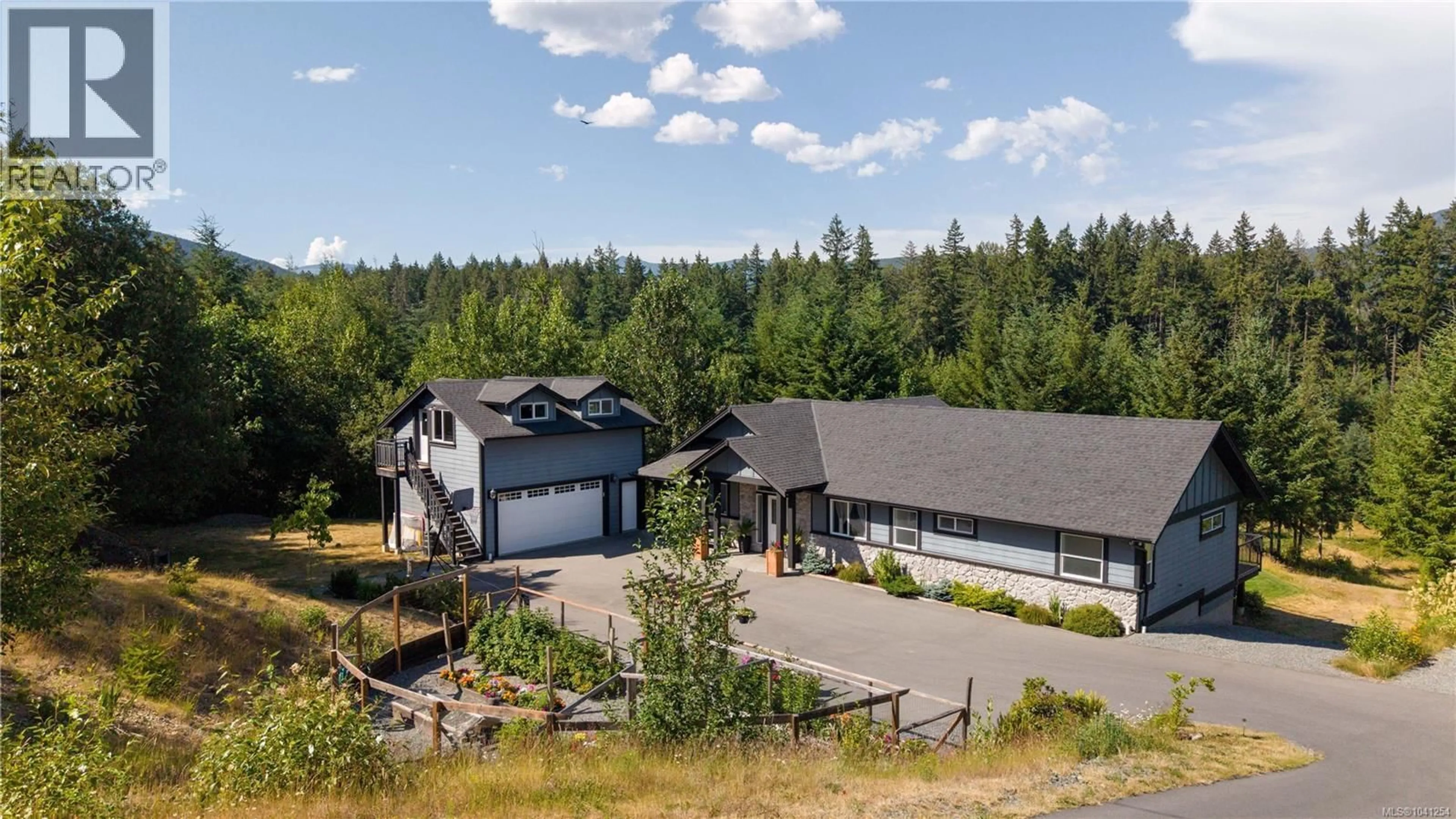 A pic from outside/outdoor area/front of a property/back of a property/a pic from drone, mountain view for 6069 CLEMENTS ROAD, Duncan British Columbia V9L6J8