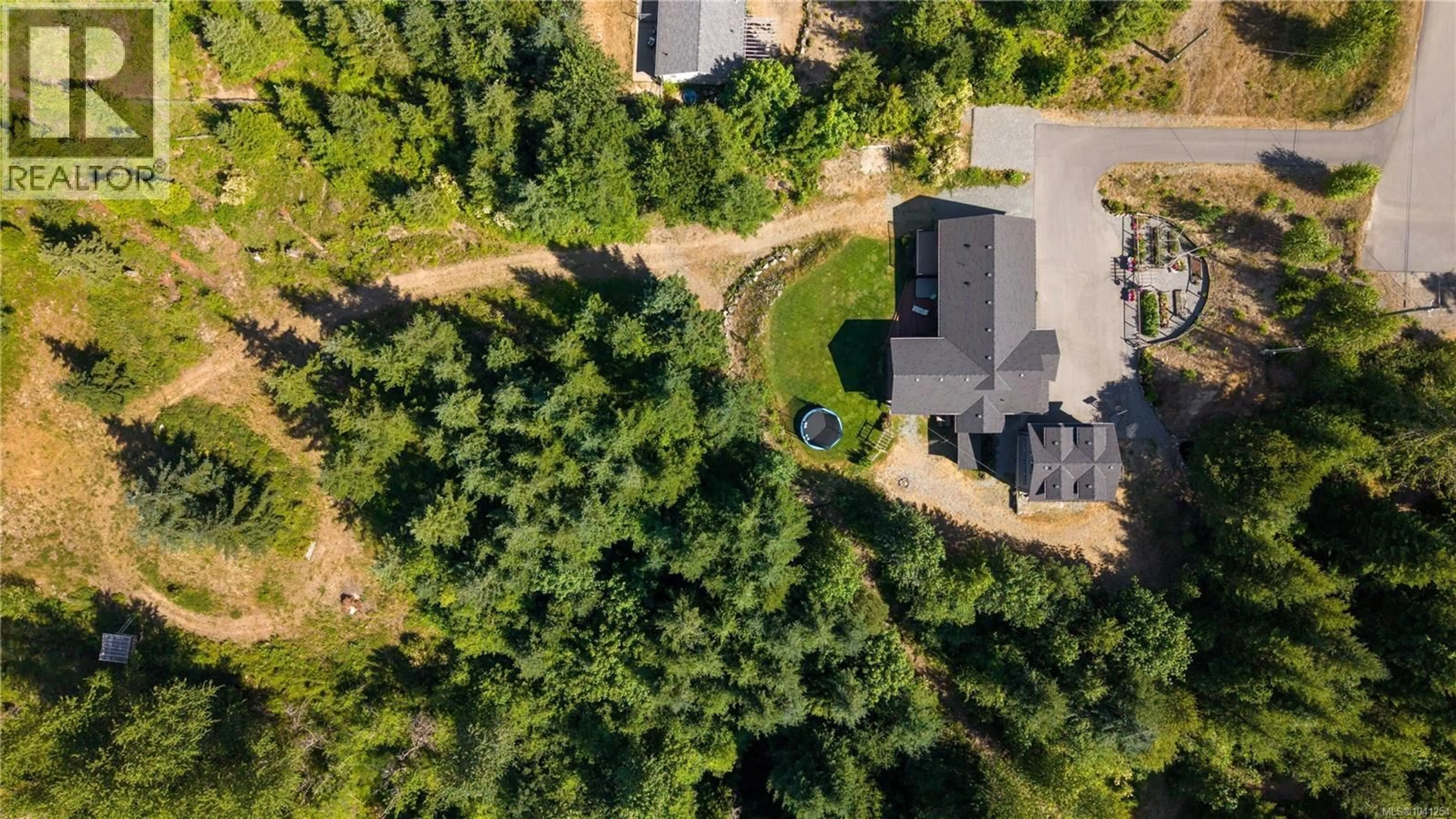 A pic from outside/outdoor area/front of a property/back of a property/a pic from drone, forest/trees view for 6069 CLEMENTS ROAD, Duncan British Columbia V9L6J8