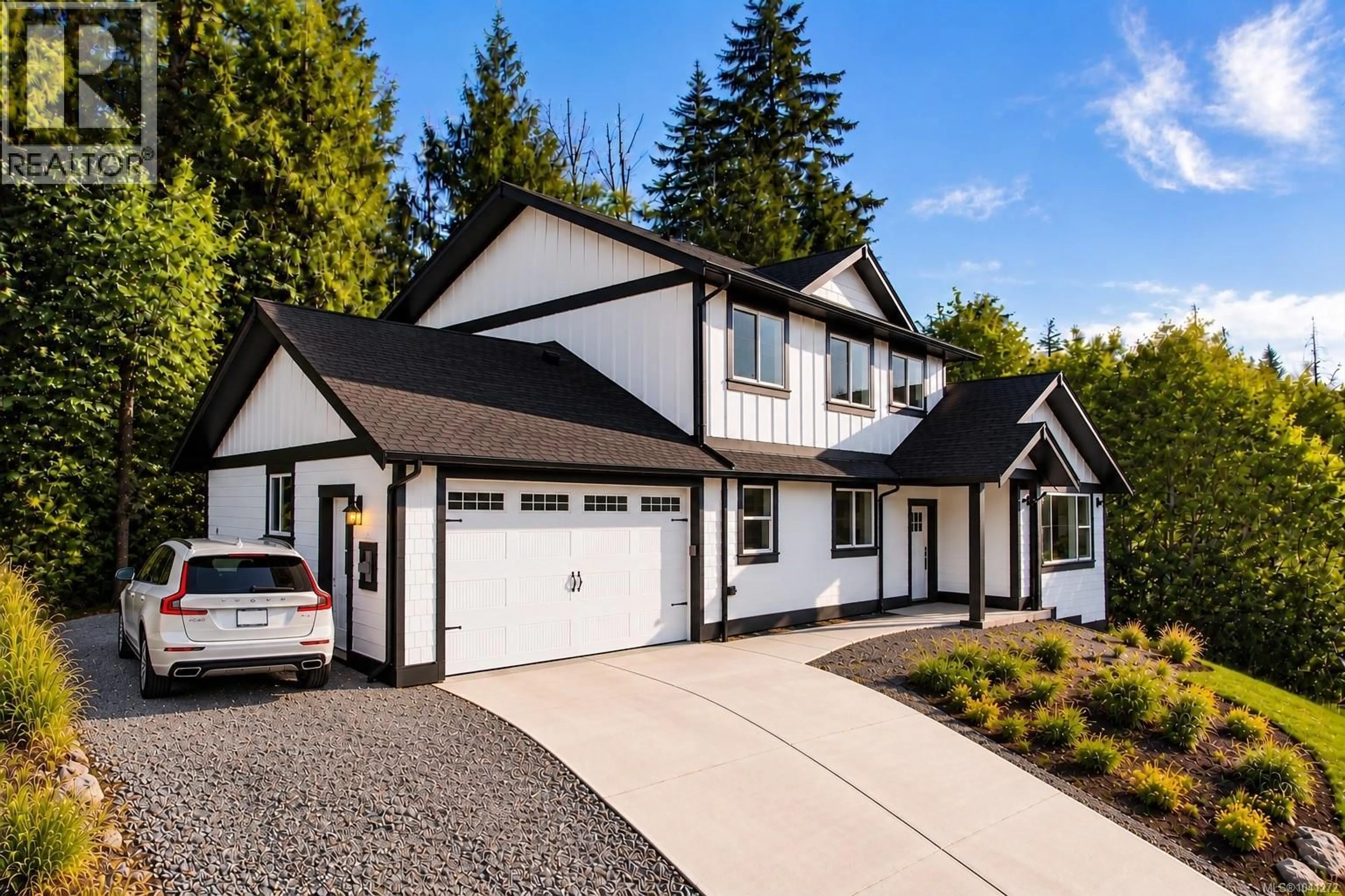 Home with vinyl exterior material, street for 276 TAL ROAD, Lake Cowichan British Columbia V0R2G0