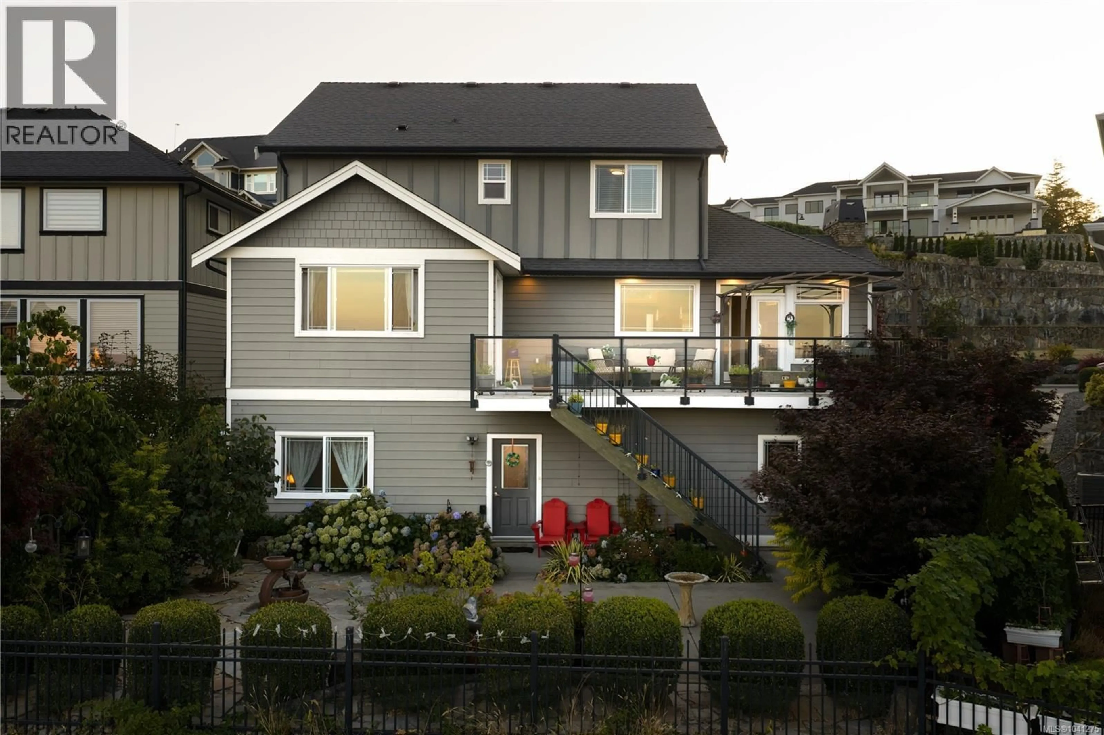 Home with vinyl exterior material, street for 2287 NICKLAUS DRIVE, Langford British Columbia V9B0L2