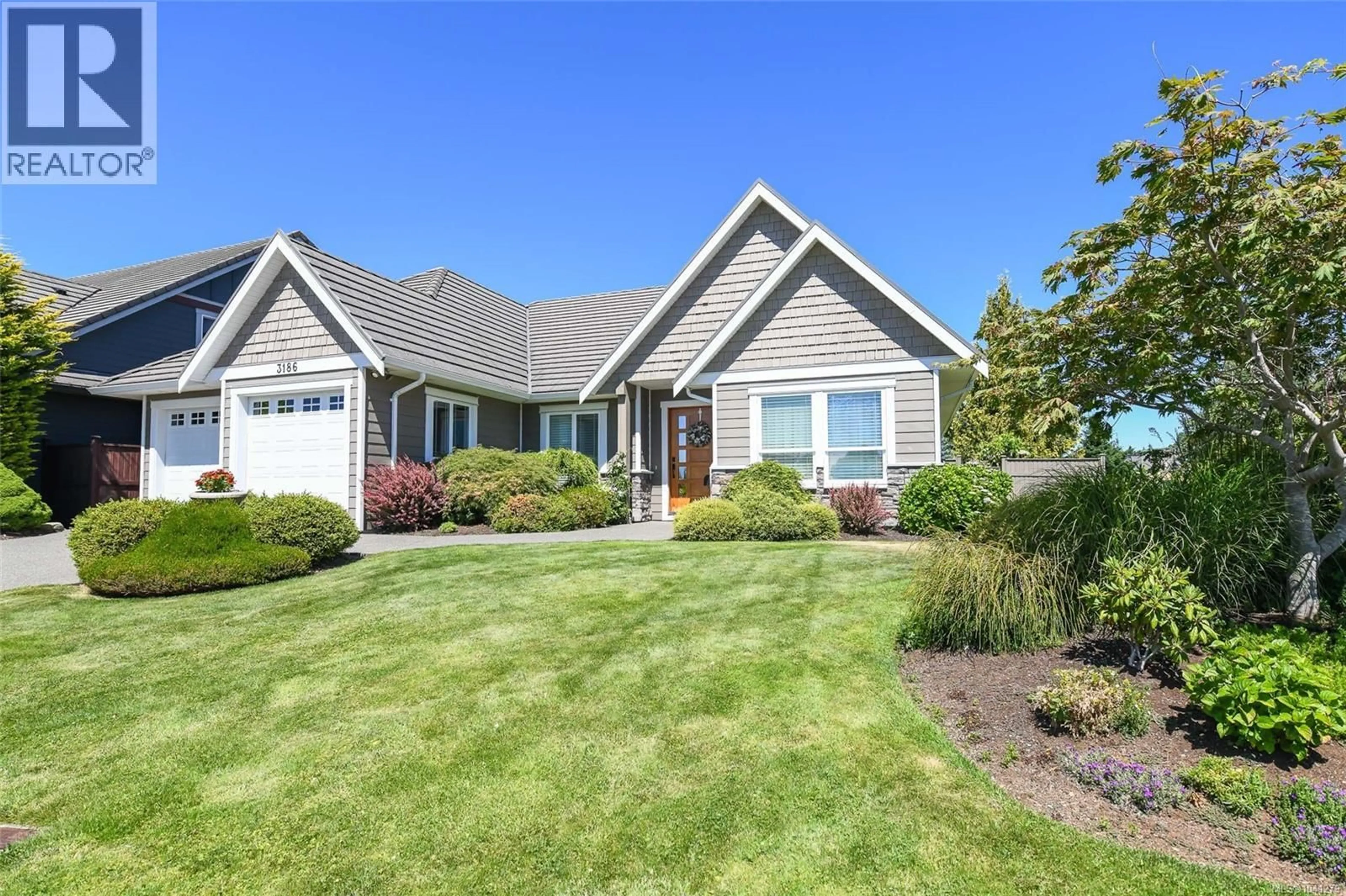 Home with vinyl exterior material, street for 3186 ROYAL VISTA WAY, Courtenay British Columbia V9N9X3