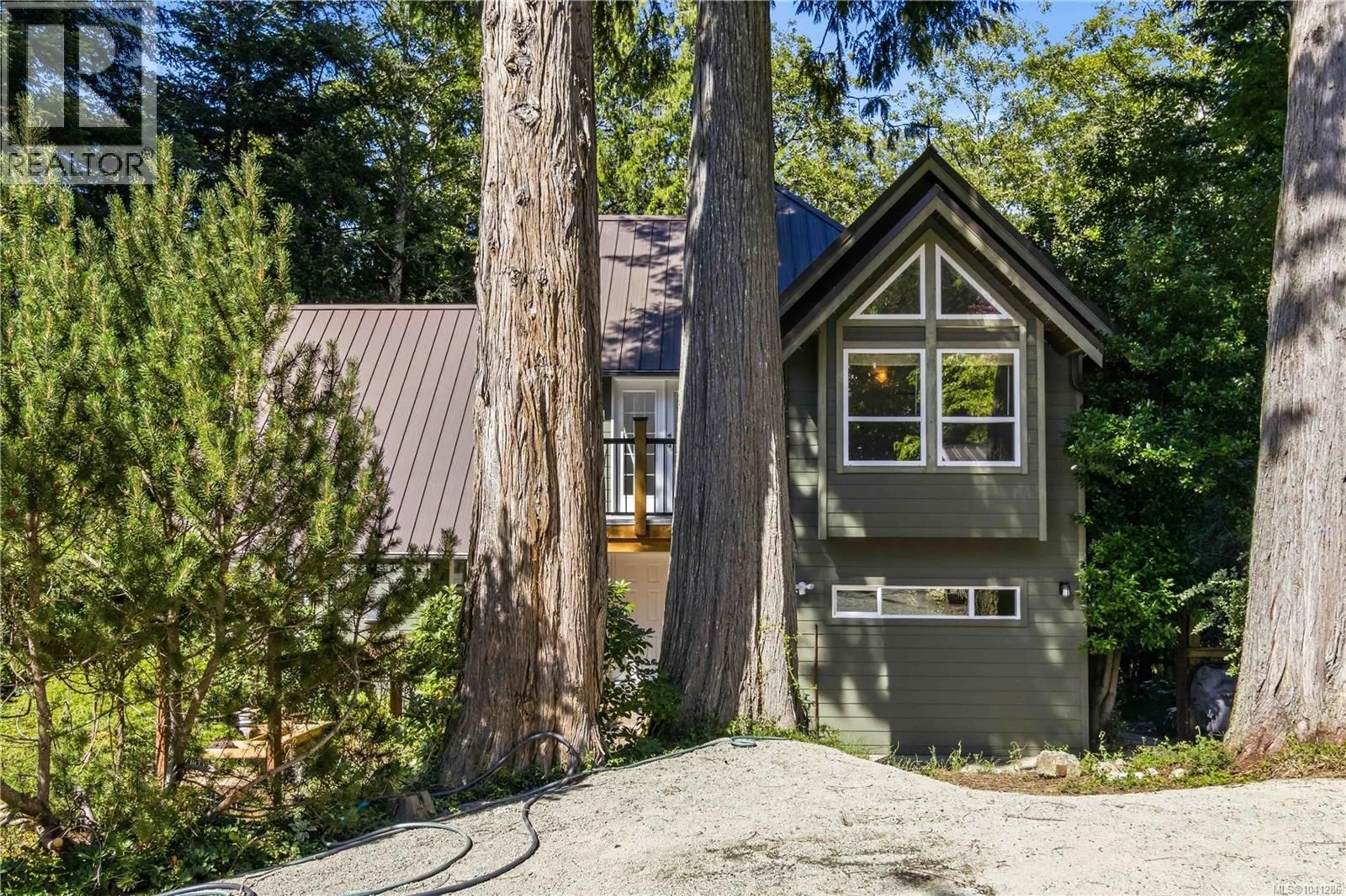 Home with vinyl exterior material, forest/trees view for 1349 MARTOCK ROAD, Sooke British Columbia V0S1N0