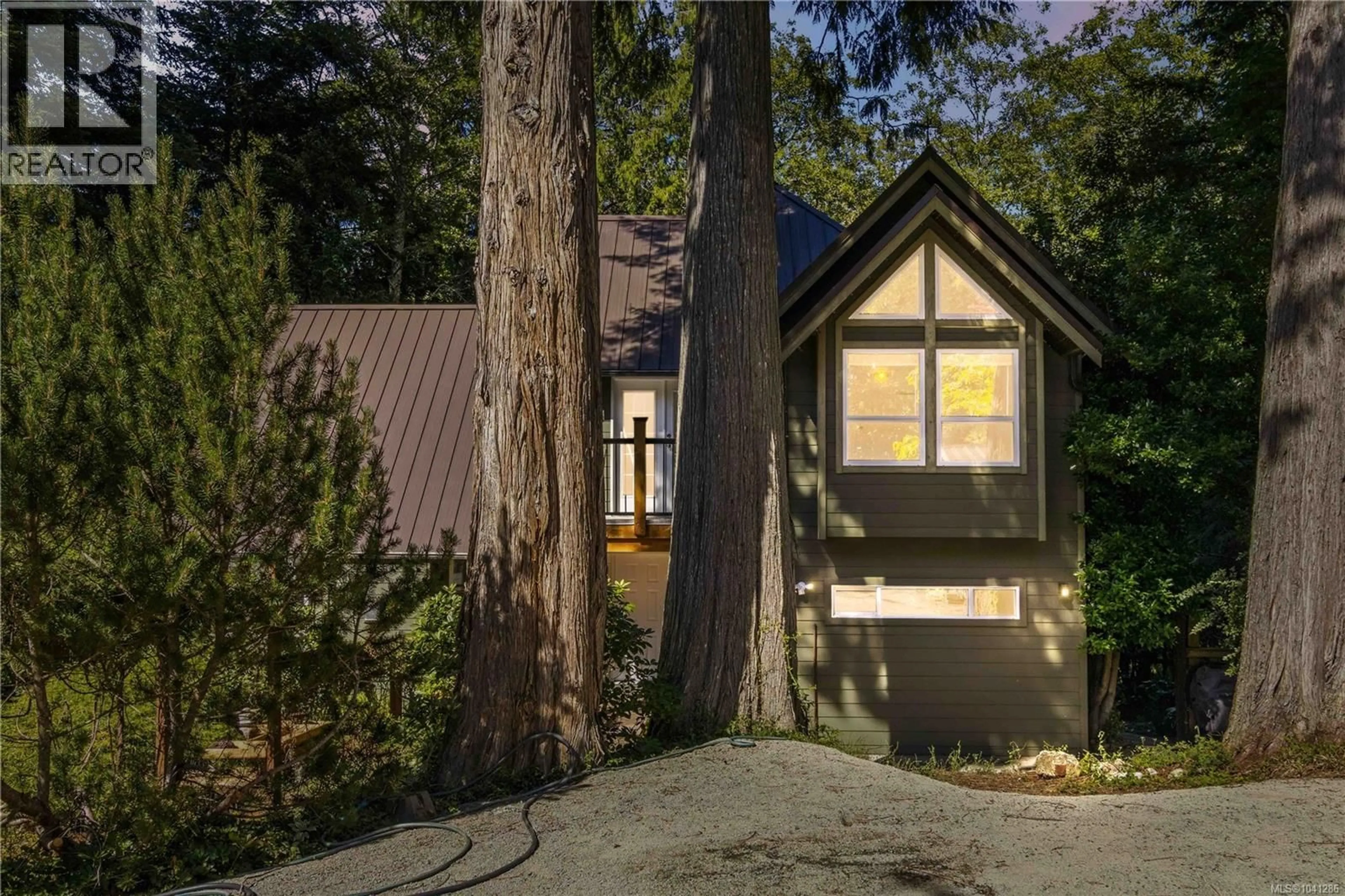 Home with vinyl exterior material, forest/trees view for 1349 MARTOCK ROAD, Sooke British Columbia V0S1N0