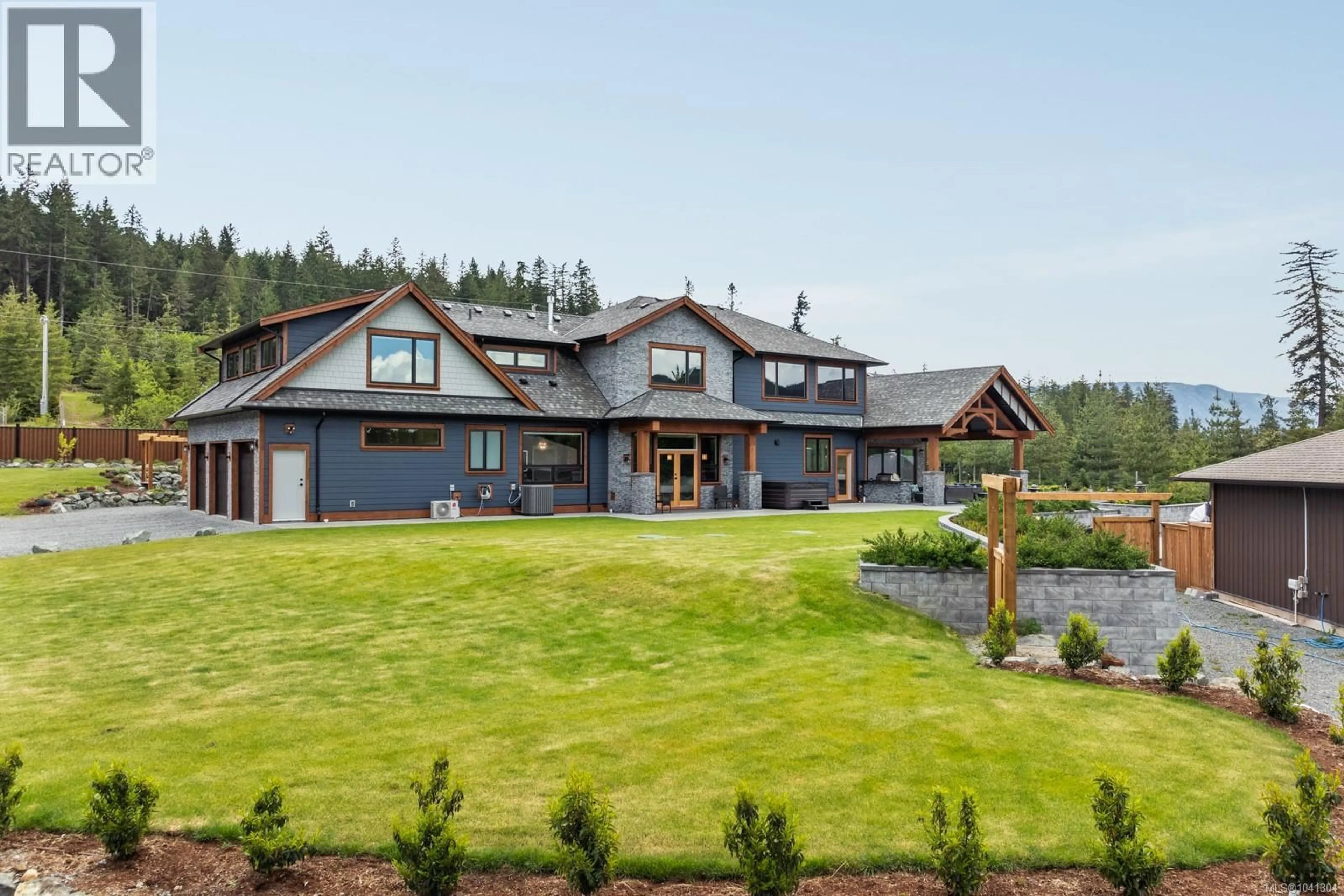 A pic from outside/outdoor area/front of a property/back of a property/a pic from drone, mountain view for 2833 WOODCROFT PLACE, Shawnigan Lake British Columbia V8H2E4