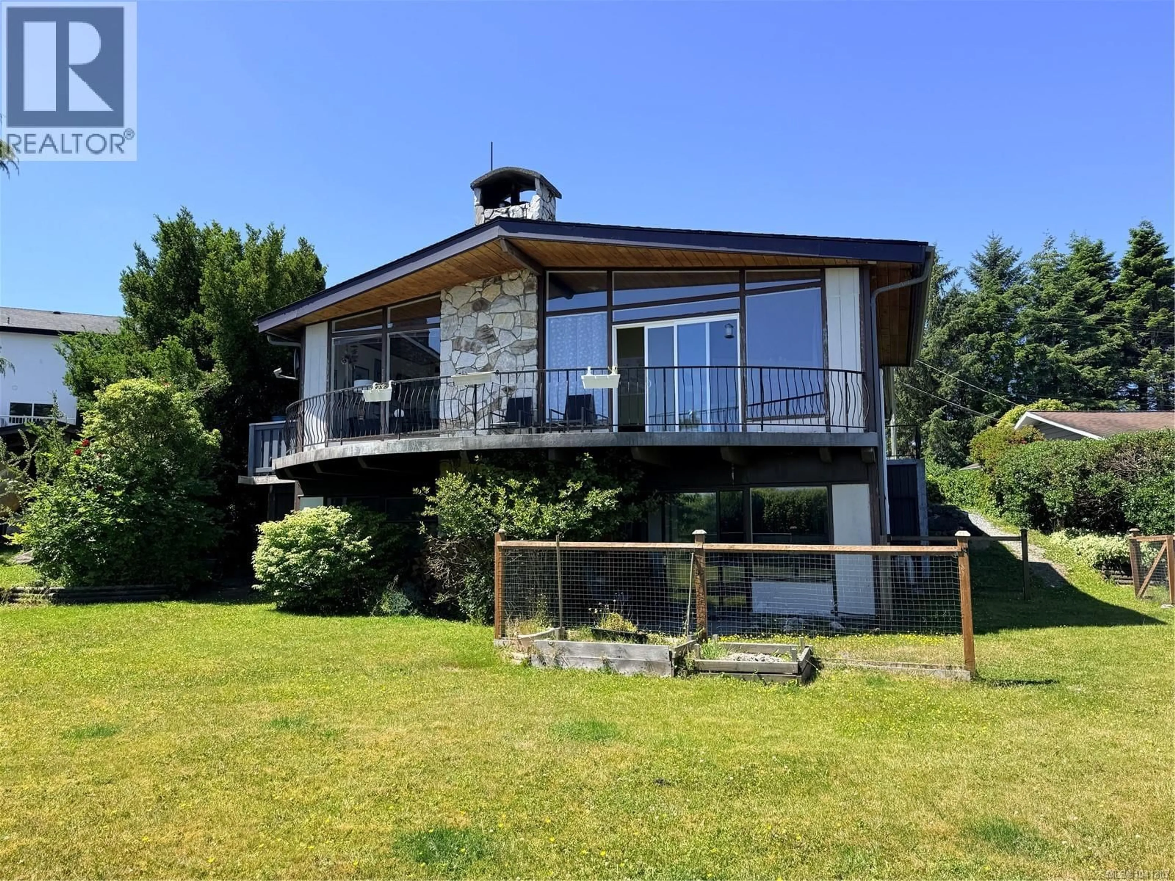 A pic from outside/outdoor area/front of a property/back of a property/a pic from drone, building for 2472 MOUNTVIEW ROAD, Port McNeill British Columbia V0N2R0
