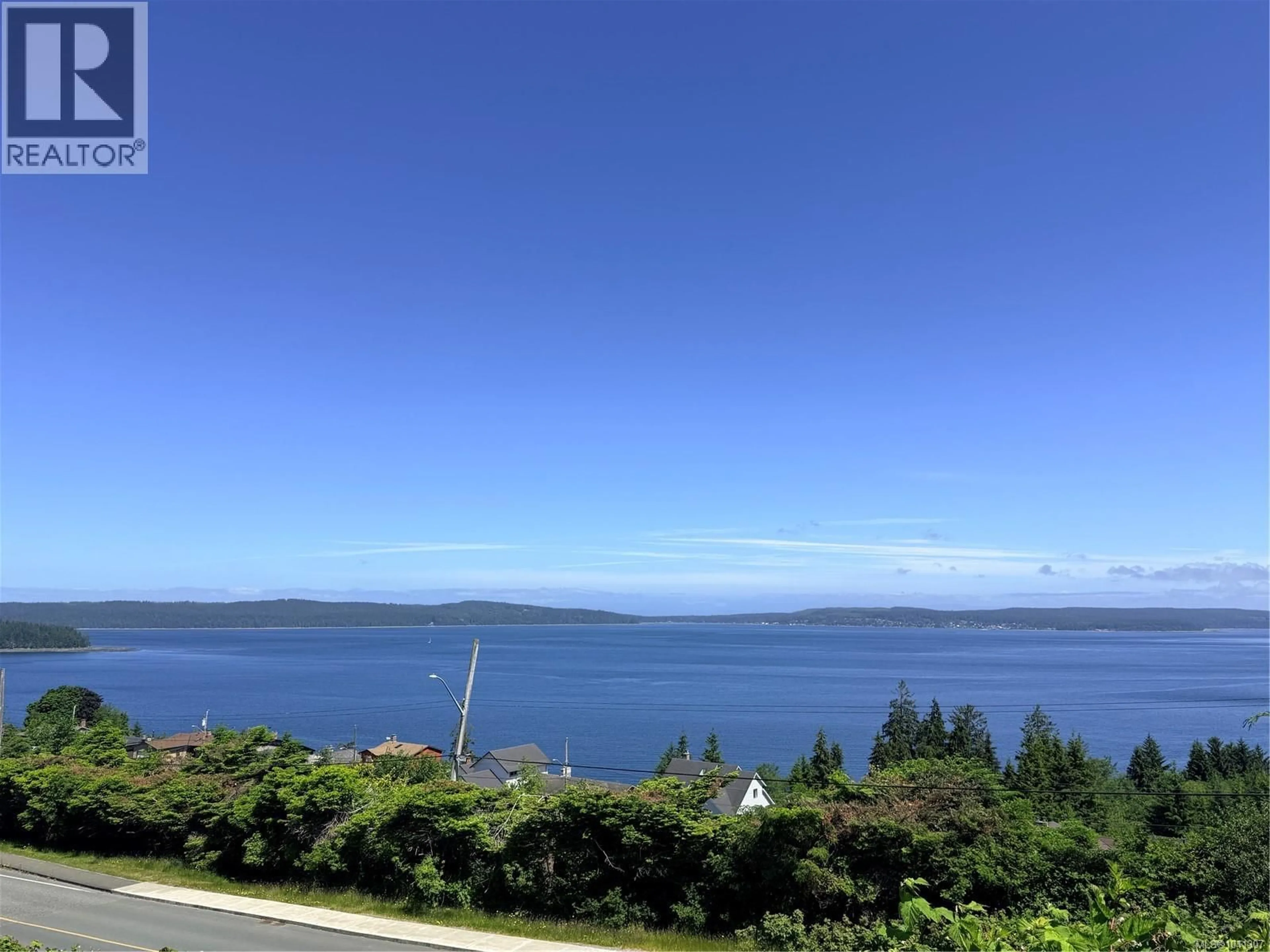 A pic from outside/outdoor area/front of a property/back of a property/a pic from drone, water/lake/river/ocean view for 2472 MOUNTVIEW ROAD, Port McNeill British Columbia V0N2R0