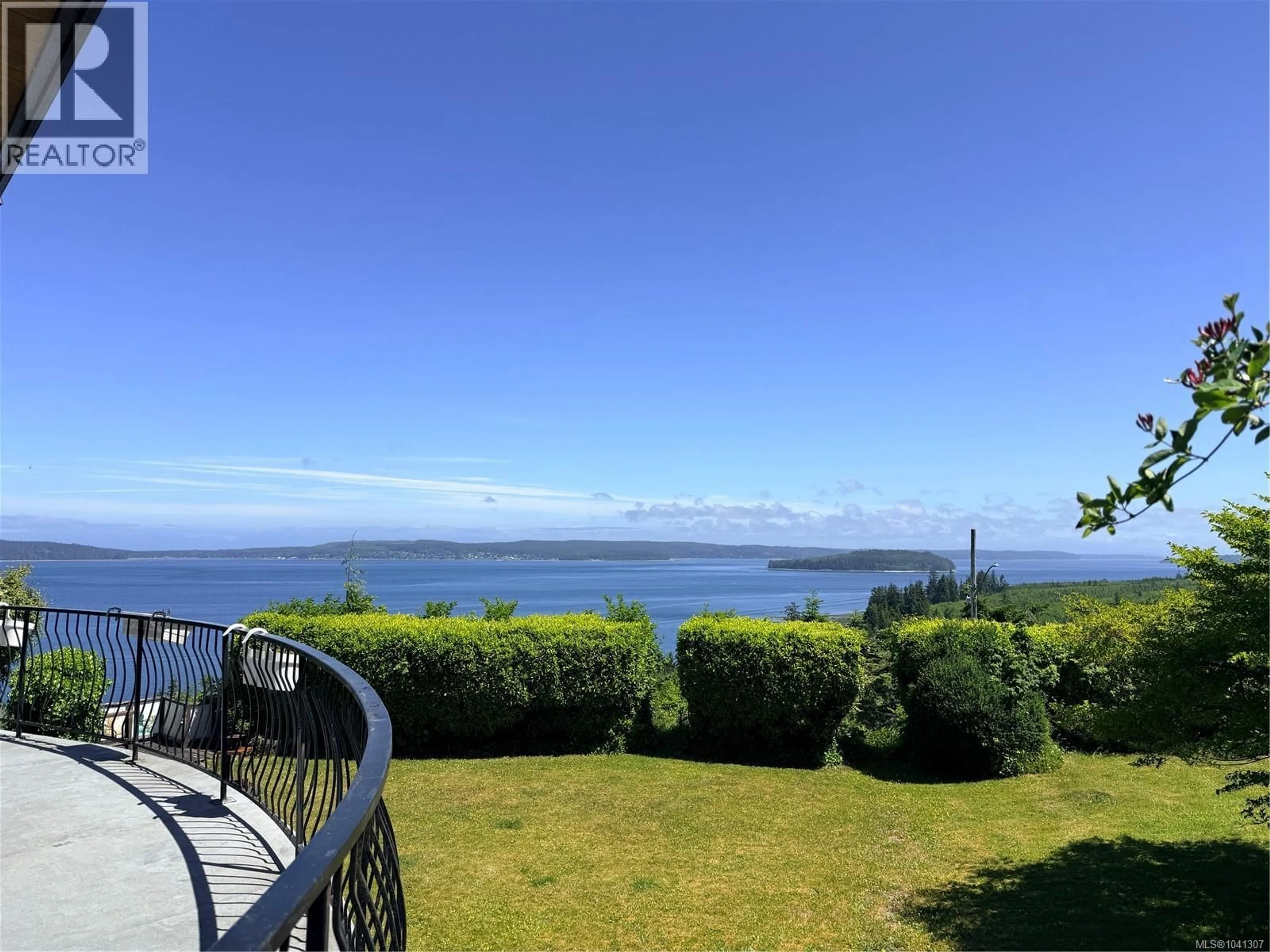 A pic from outside/outdoor area/front of a property/back of a property/a pic from drone, water/lake/river/ocean view for 2472 MOUNTVIEW ROAD, Port McNeill British Columbia V0N2R0