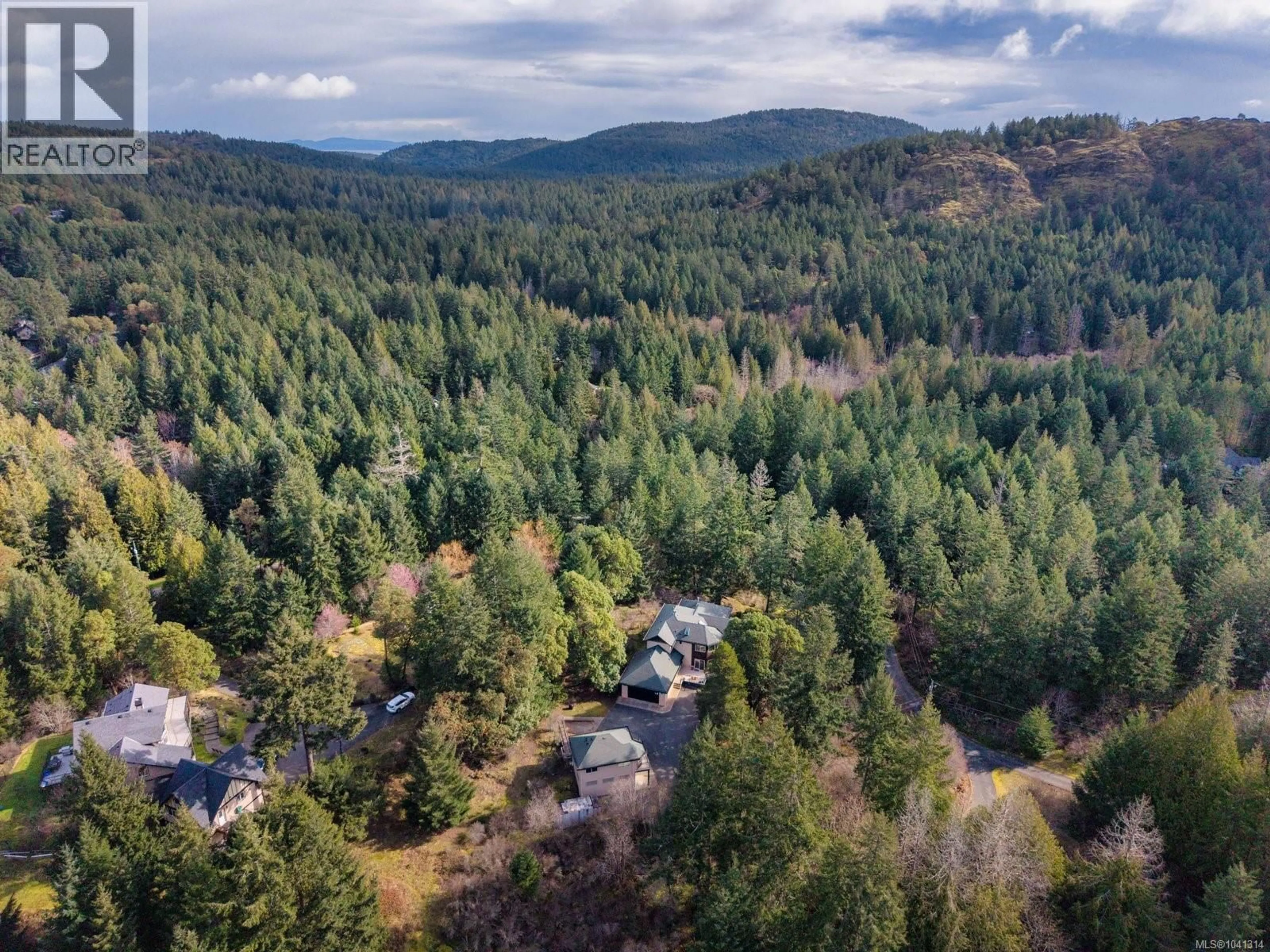 A pic from outside/outdoor area/front of a property/back of a property/a pic from drone, forest/trees view for 1450 WHITE PINE TERRACE, Highlands British Columbia V9B6J3