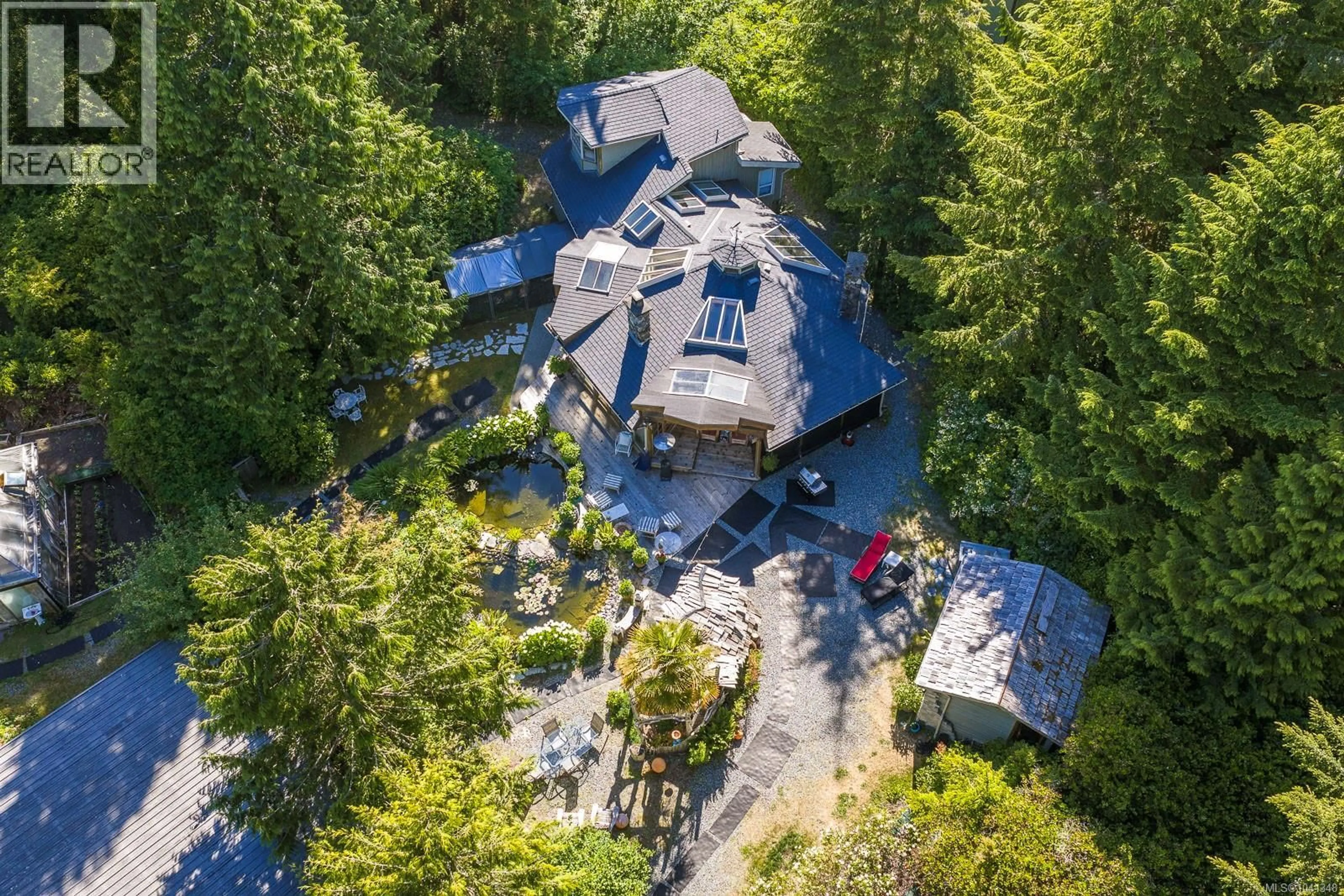 A pic from outside/outdoor area/front of a property/back of a property/a pic from drone, forest/trees view for 1364 CHESTERMAN BEACH ROAD, Tofino British Columbia V0R2Z0