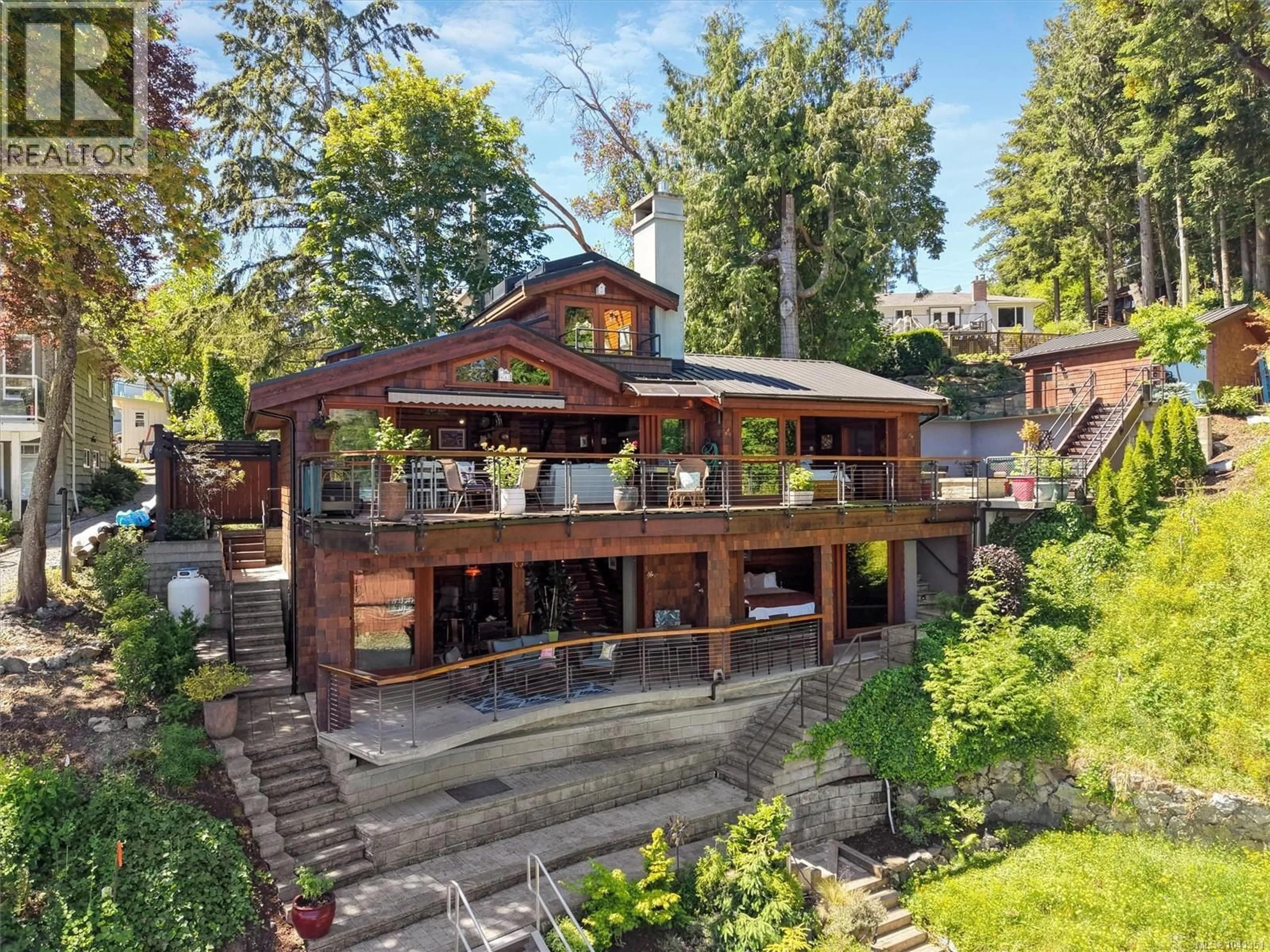Home with brick exterior material, unknown for 10968 MADRONA DRIVE, North Saanich British Columbia V8R6K2