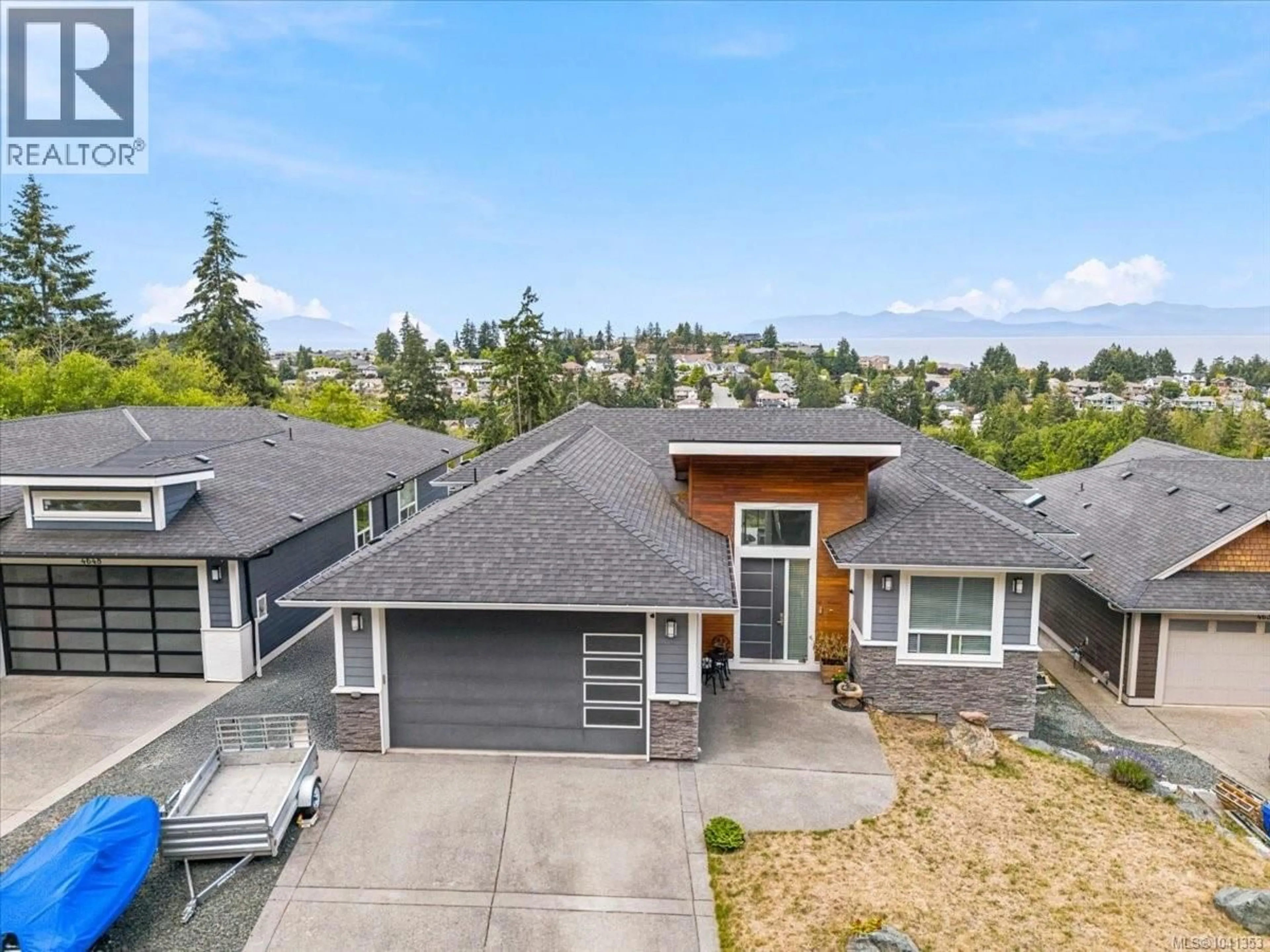 A pic from outside/outdoor area/front of a property/back of a property/a pic from drone, street for 4642 SHERIDAN RIDGE ROAD, Nanaimo British Columbia V9T6S6