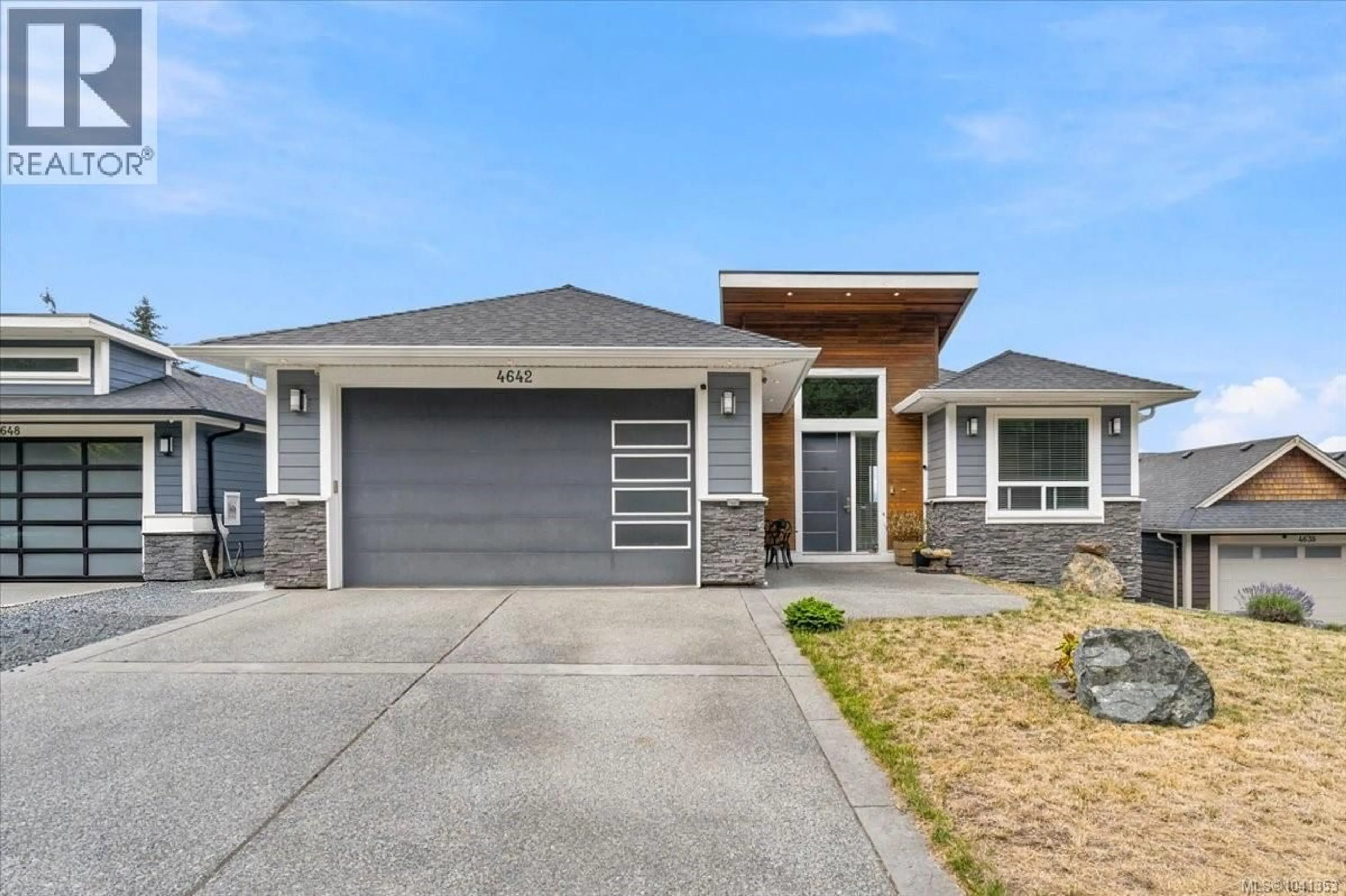 Home with vinyl exterior material, street for 4642 SHERIDAN RIDGE ROAD, Nanaimo British Columbia V9T6S6