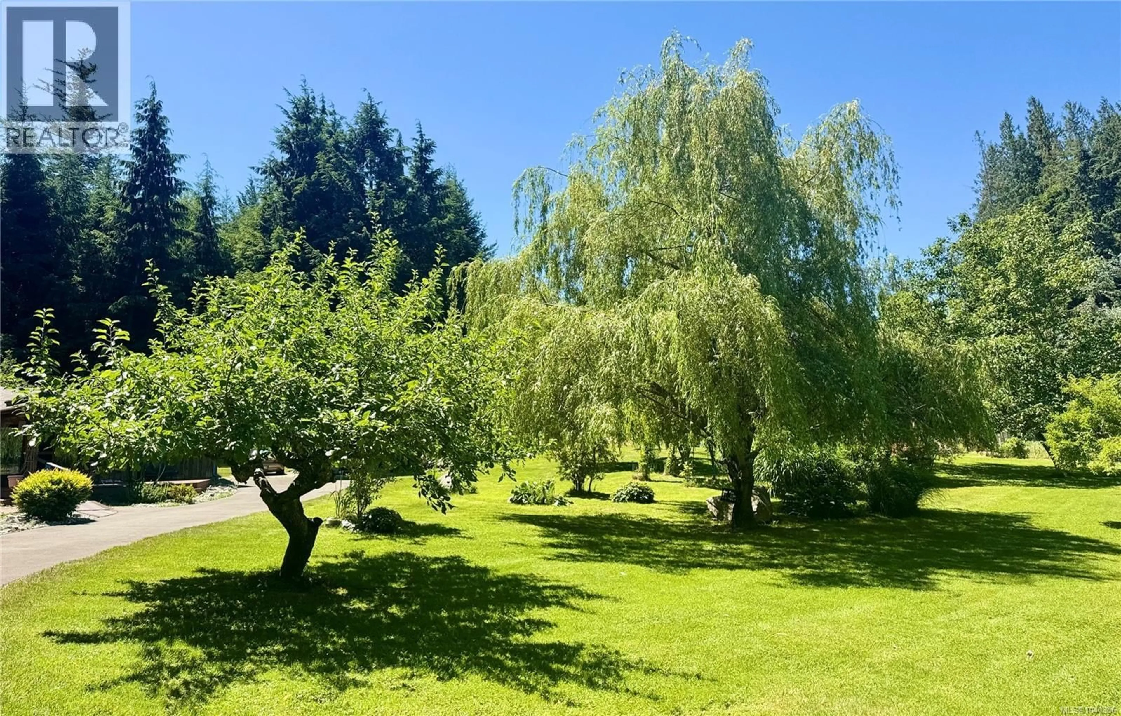 Patio, forest/trees view for 1107 KW'AS BAY ROAD, Cortes Island British Columbia V0P1K0