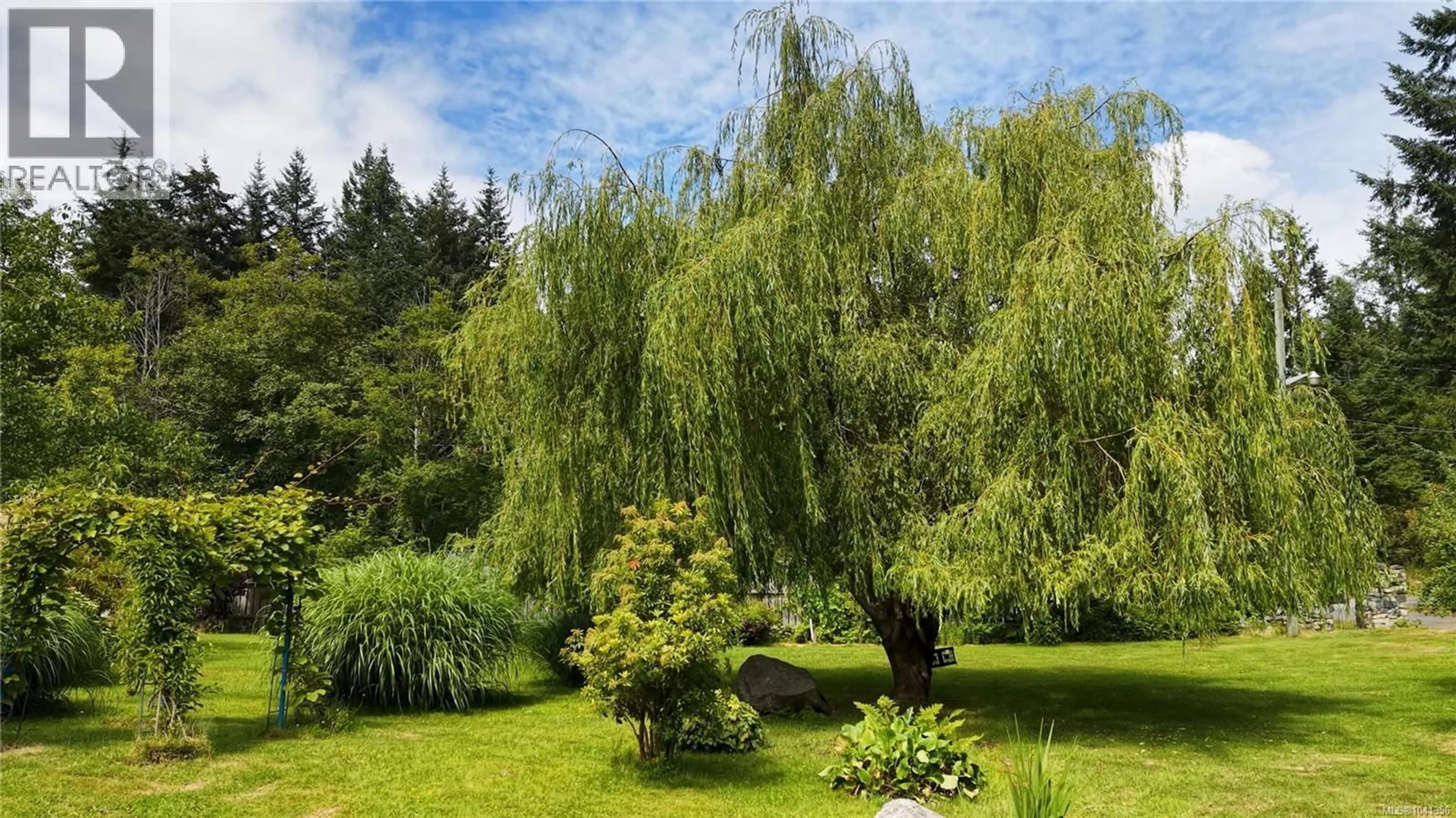 Patio, forest/trees view for 1107 KW'AS BAY ROAD, Cortes Island British Columbia V0P1K0