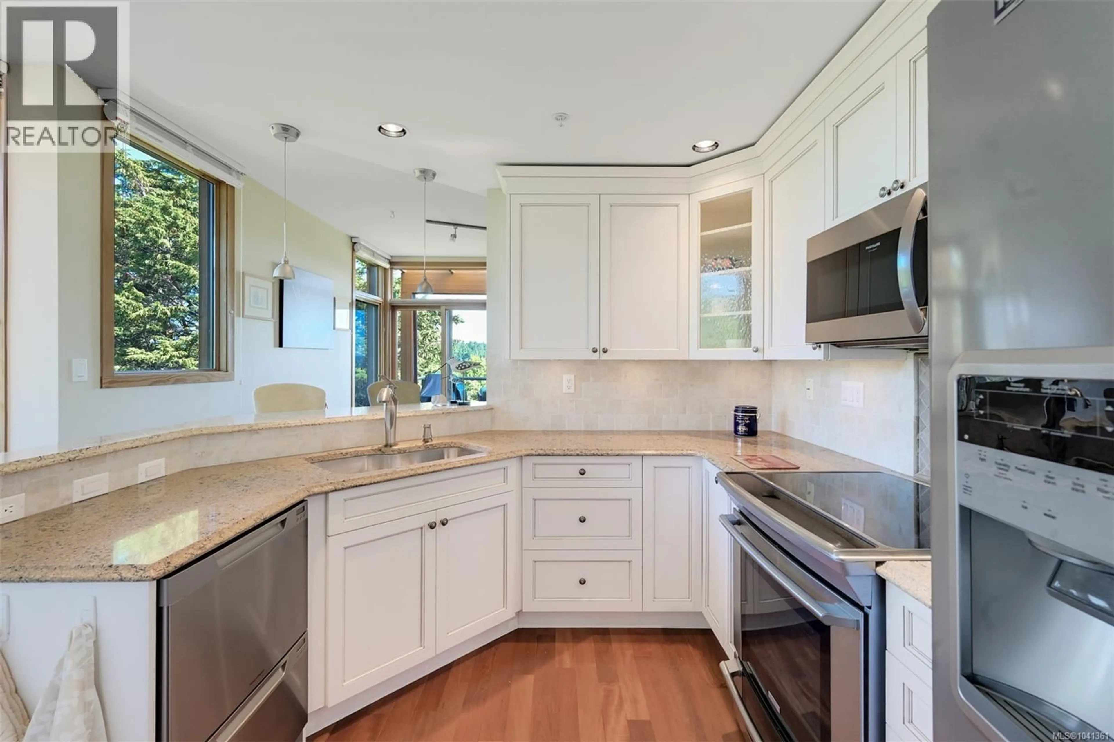 Open concept kitchen, ceramic/tile floor for 408 - 5329 CORDOVA BAY ROAD, Saanich British Columbia V8Y2L3