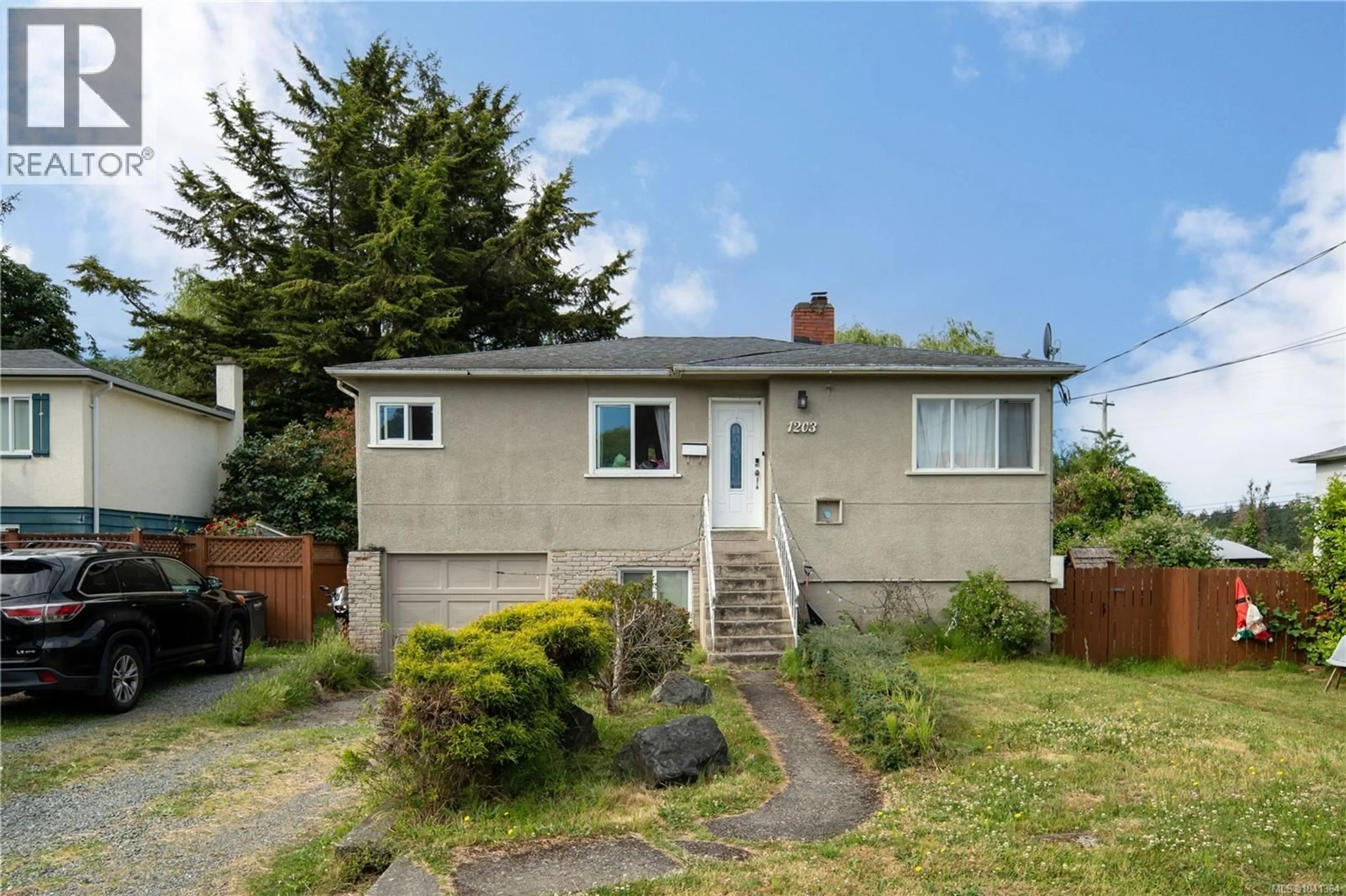Home with vinyl exterior material, street for 1203 PEARCE CRESCENT, Saanich British Columbia V8X3S8