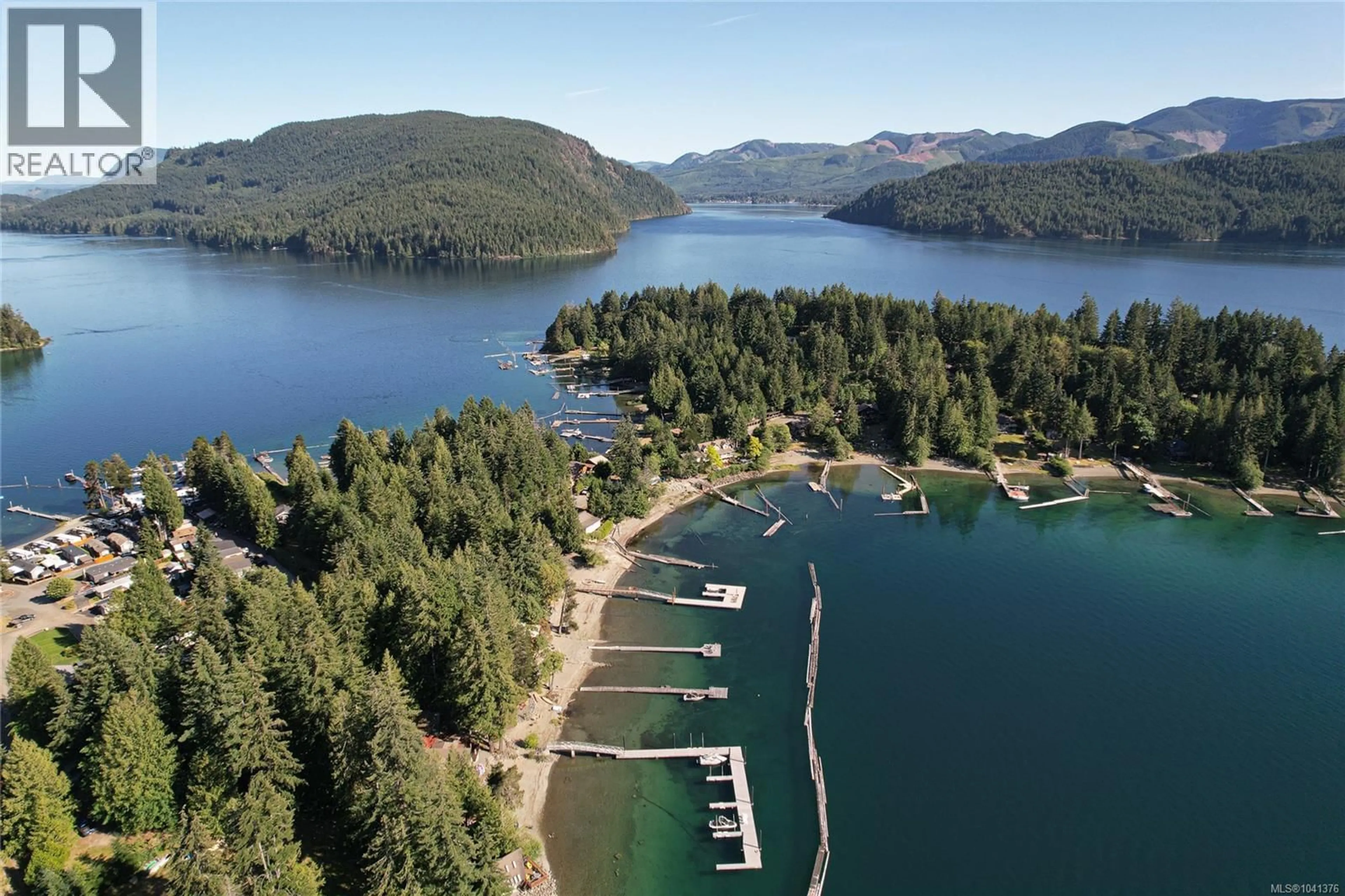 A pic from outside/outdoor area/front of a property/back of a property/a pic from drone, water/lake/river/ocean view for 3A - 8360 SA-SEEN-OS ROAD, Youbou British Columbia V0R3E1