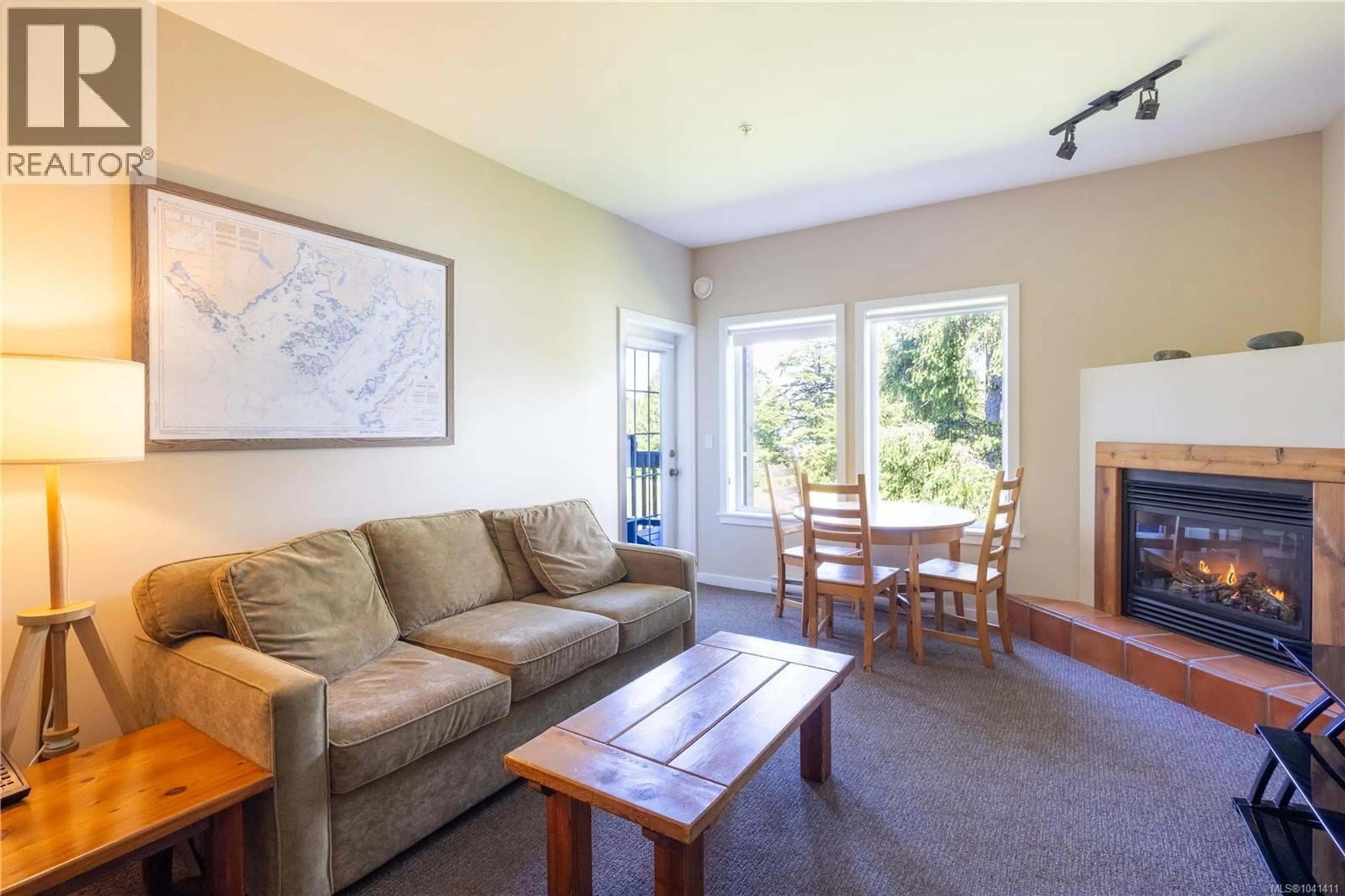 Living room with furniture, wood/laminate floor for 508 - 1971 HARBOUR DRIVE, Ucluelet British Columbia V0R3A0