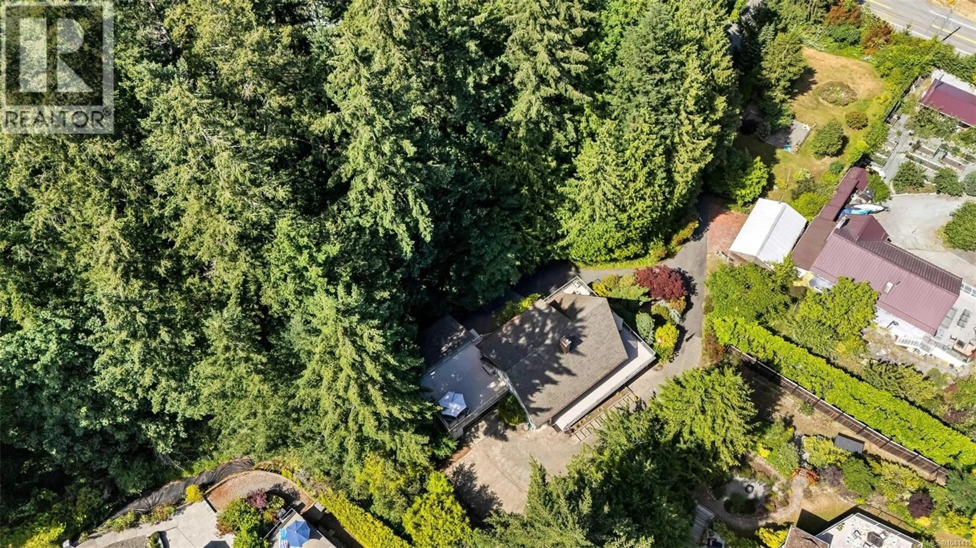 A pic from outside/outdoor area/front of a property/back of a property/a pic from drone, forest/trees view for 2460 MILL BAY ROAD, Mill Bay British Columbia V0R2P0