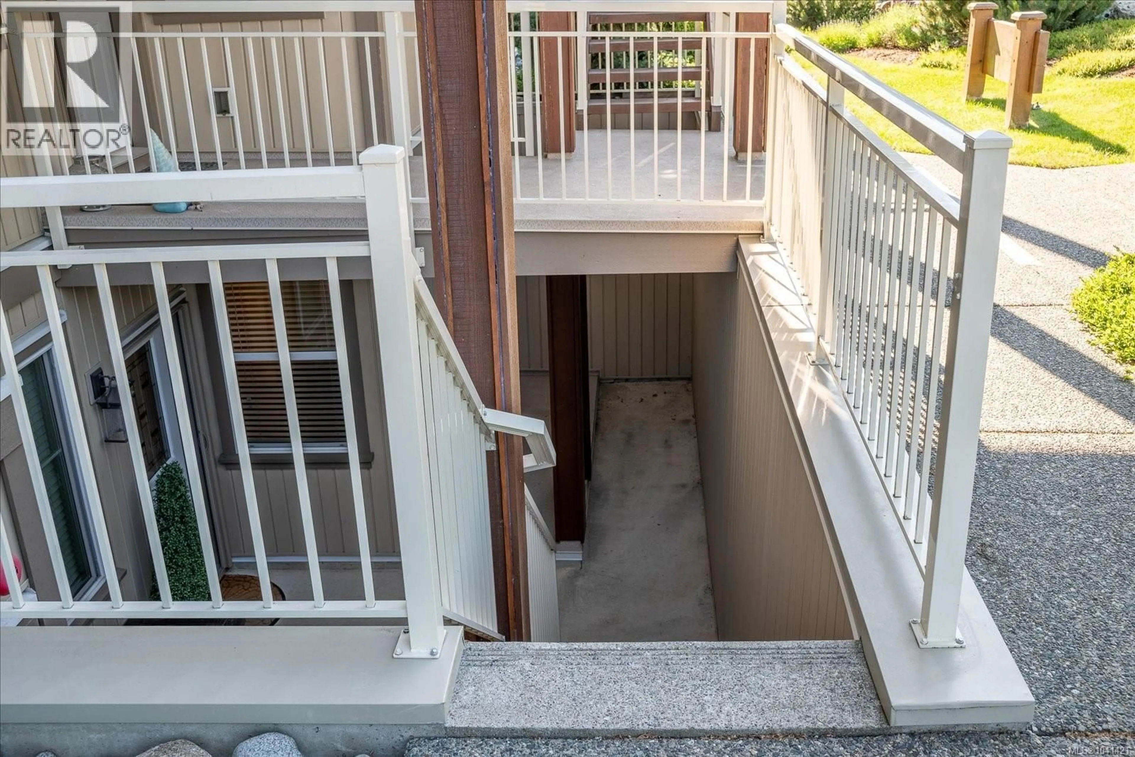 Balcony in the apartment, city buildings view from balcony for 102 - 5930 NELSON ROAD, Nanaimo British Columbia V9T5N9