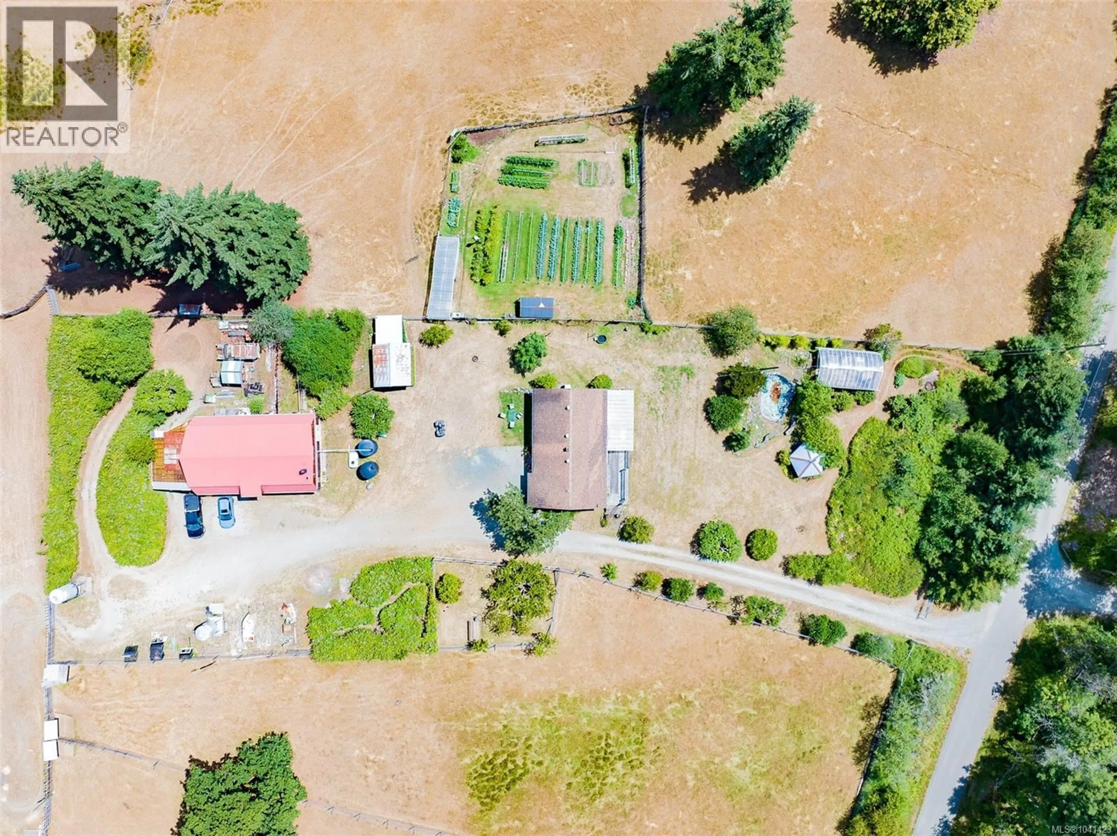 A pic from outside/outdoor area/front of a property/back of a property/a pic from drone, street for 6999 GRANVILLE ROAD, Port Alberni British Columbia V9Y7L5