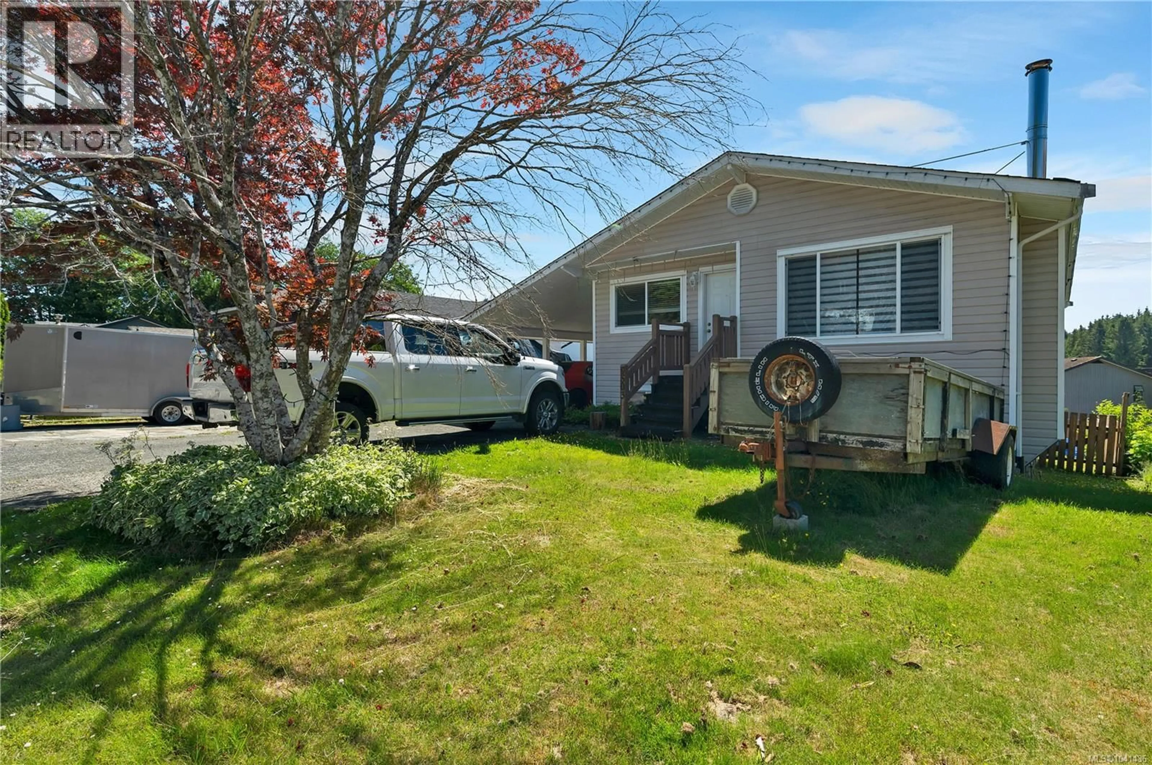 Home with vinyl exterior material, street for 9503 SCOTT STREET, Port Hardy British Columbia V0N2P0