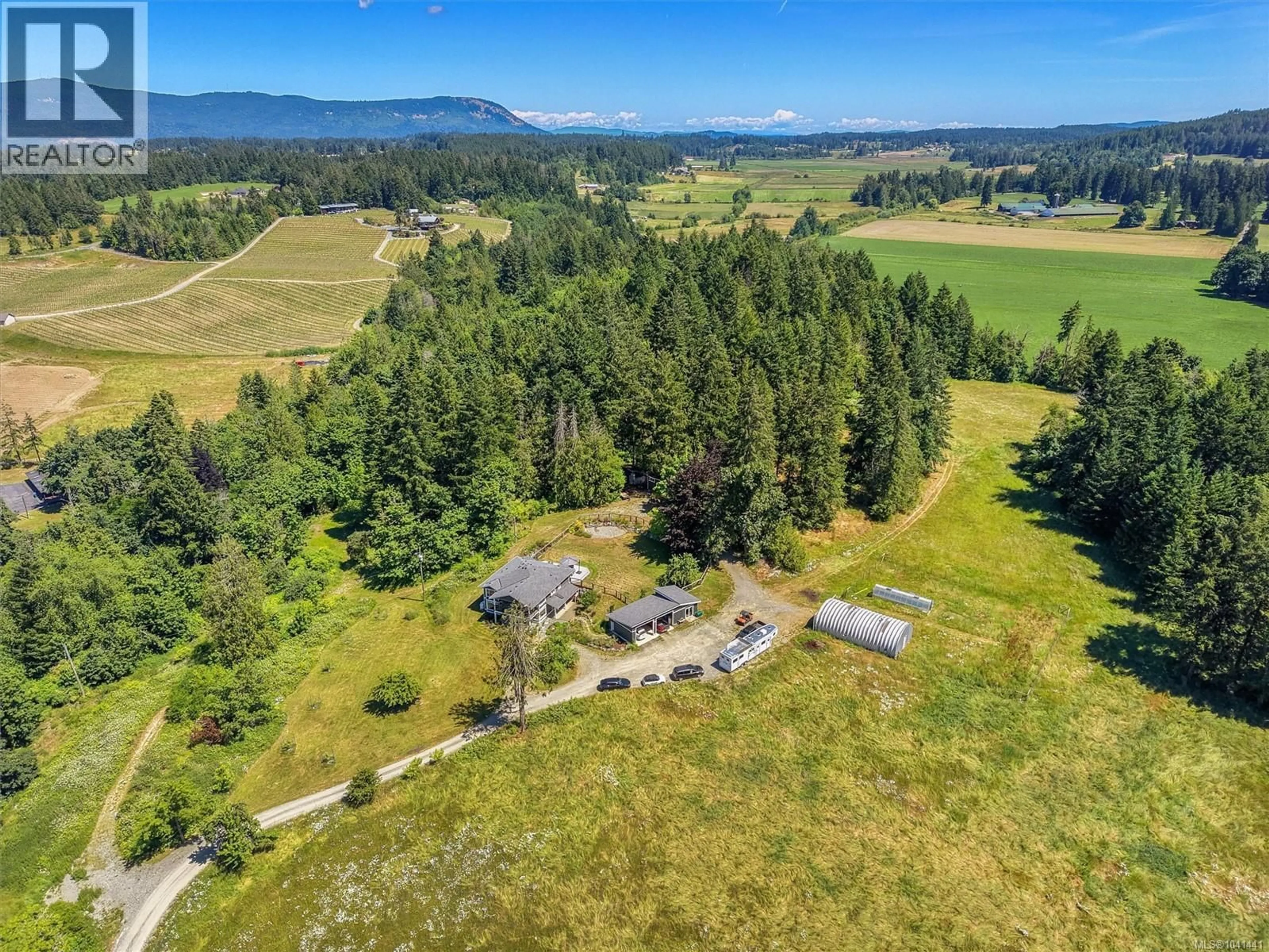 A pic from outside/outdoor area/front of a property/back of a property/a pic from drone, mountain view for 4370 MOSS ROAD, Duncan British Columbia V9L6M4