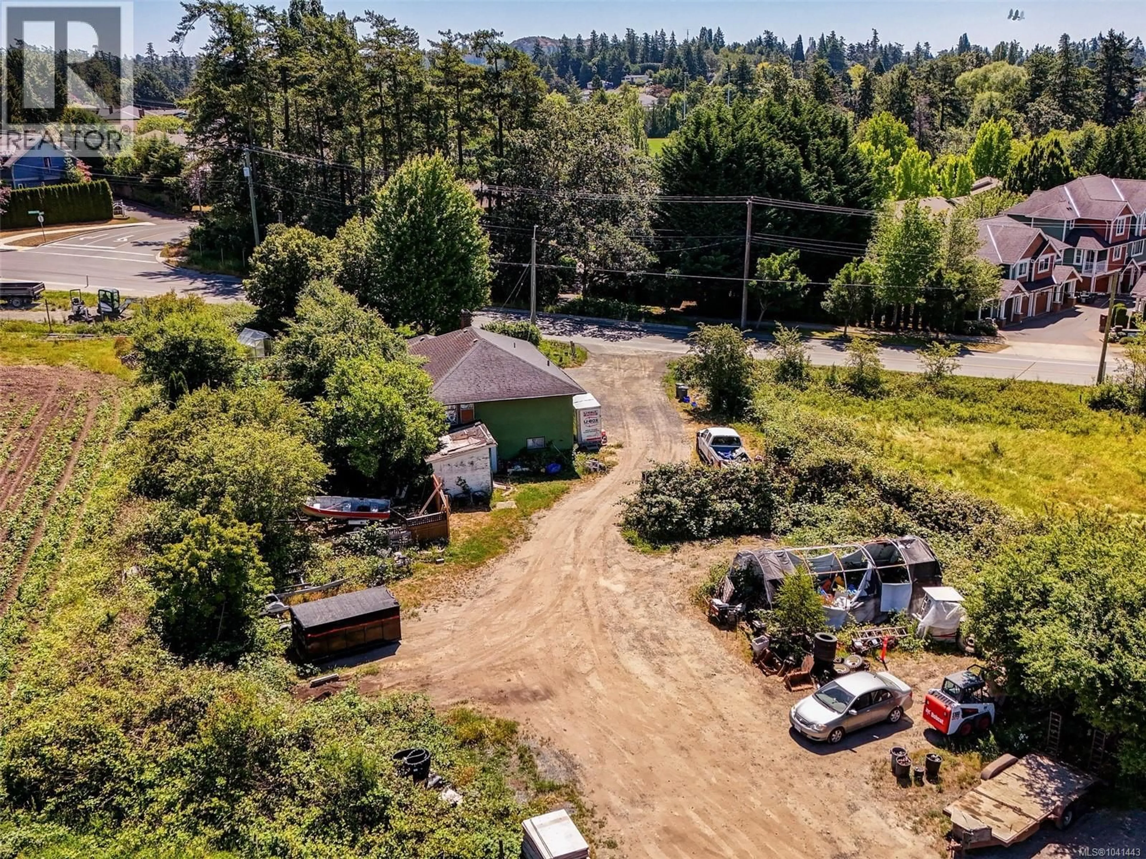 A pic from outside/outdoor area/front of a property/back of a property/a pic from drone, unknown for 4298 WILKINSON ROAD, Saanich British Columbia V8Z5B6