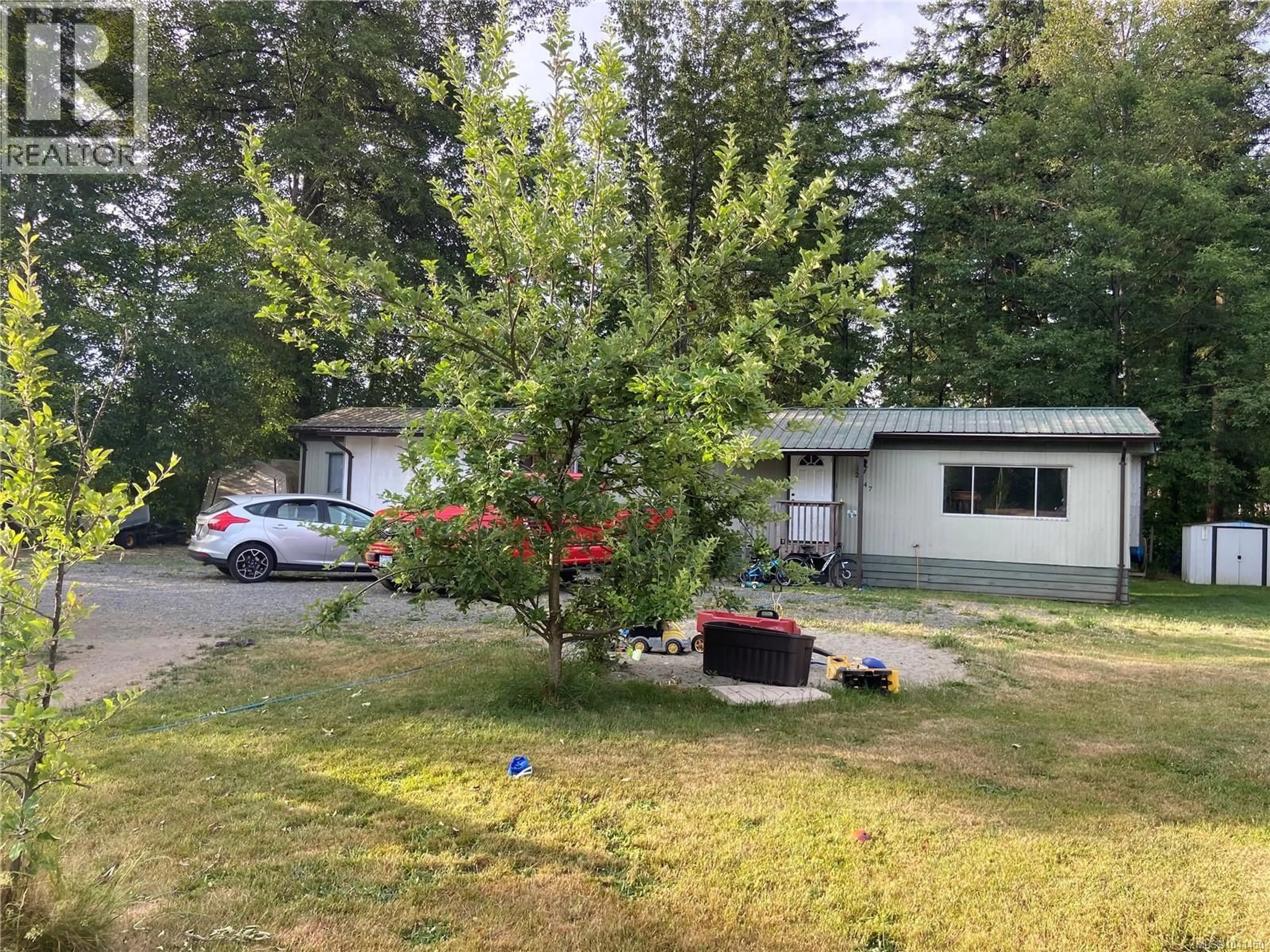 A pic from outside/outdoor area/front of a property/back of a property/a pic from drone, street for 2247 ENNS ROAD, Black Creek British Columbia V9J1H7
