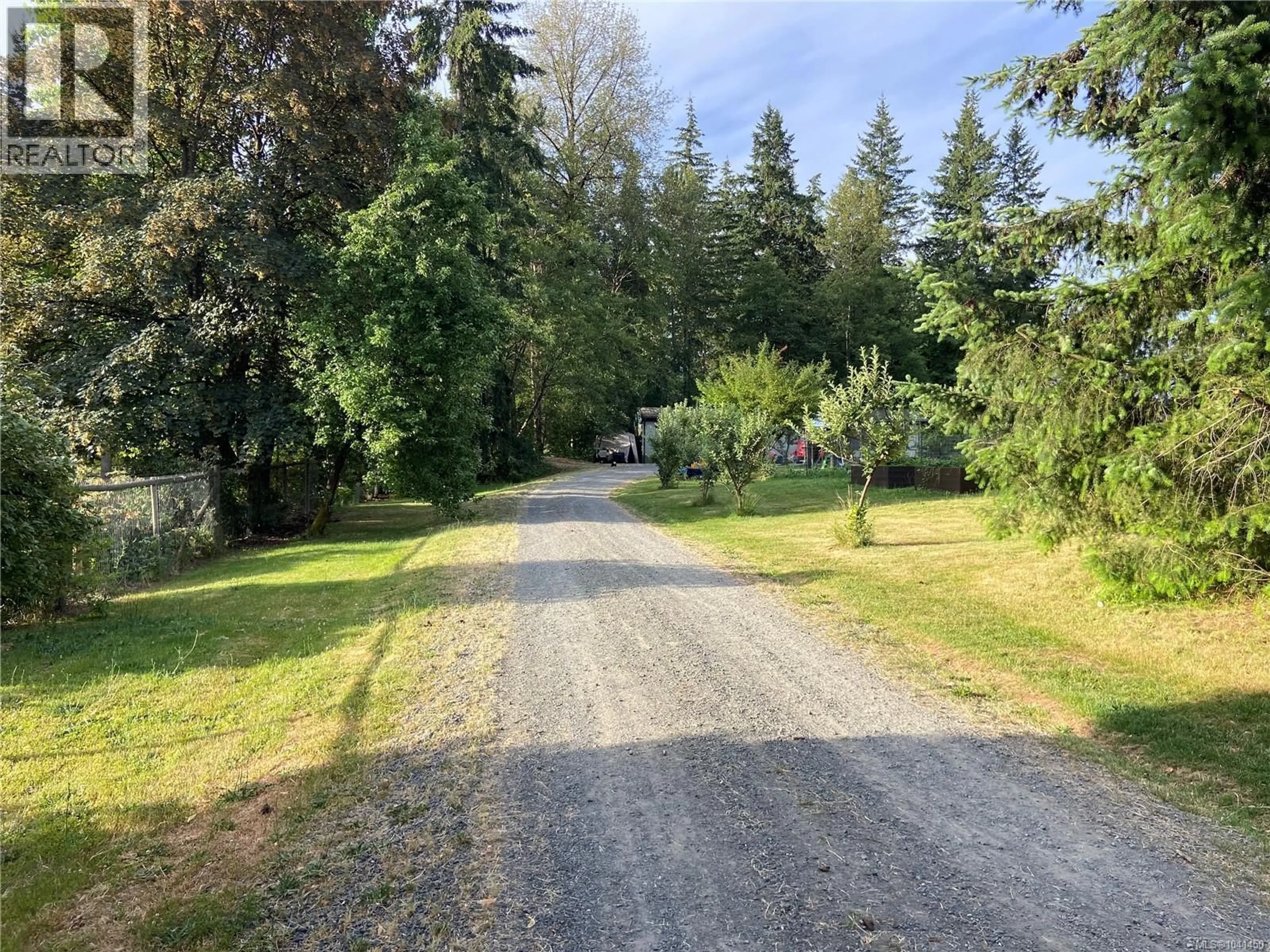 A pic from outside/outdoor area/front of a property/back of a property/a pic from drone, street for 2247 ENNS ROAD, Black Creek British Columbia V9J1H7