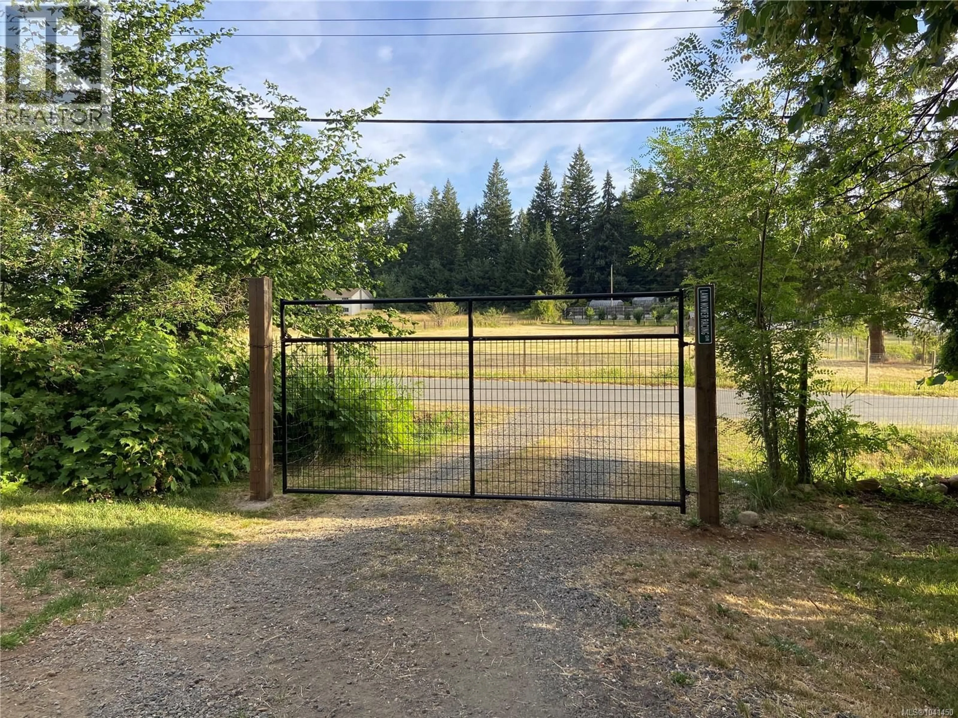 A pic from outside/outdoor area/front of a property/back of a property/a pic from drone, forest/trees view for 2247 ENNS ROAD, Black Creek British Columbia V9J1H7