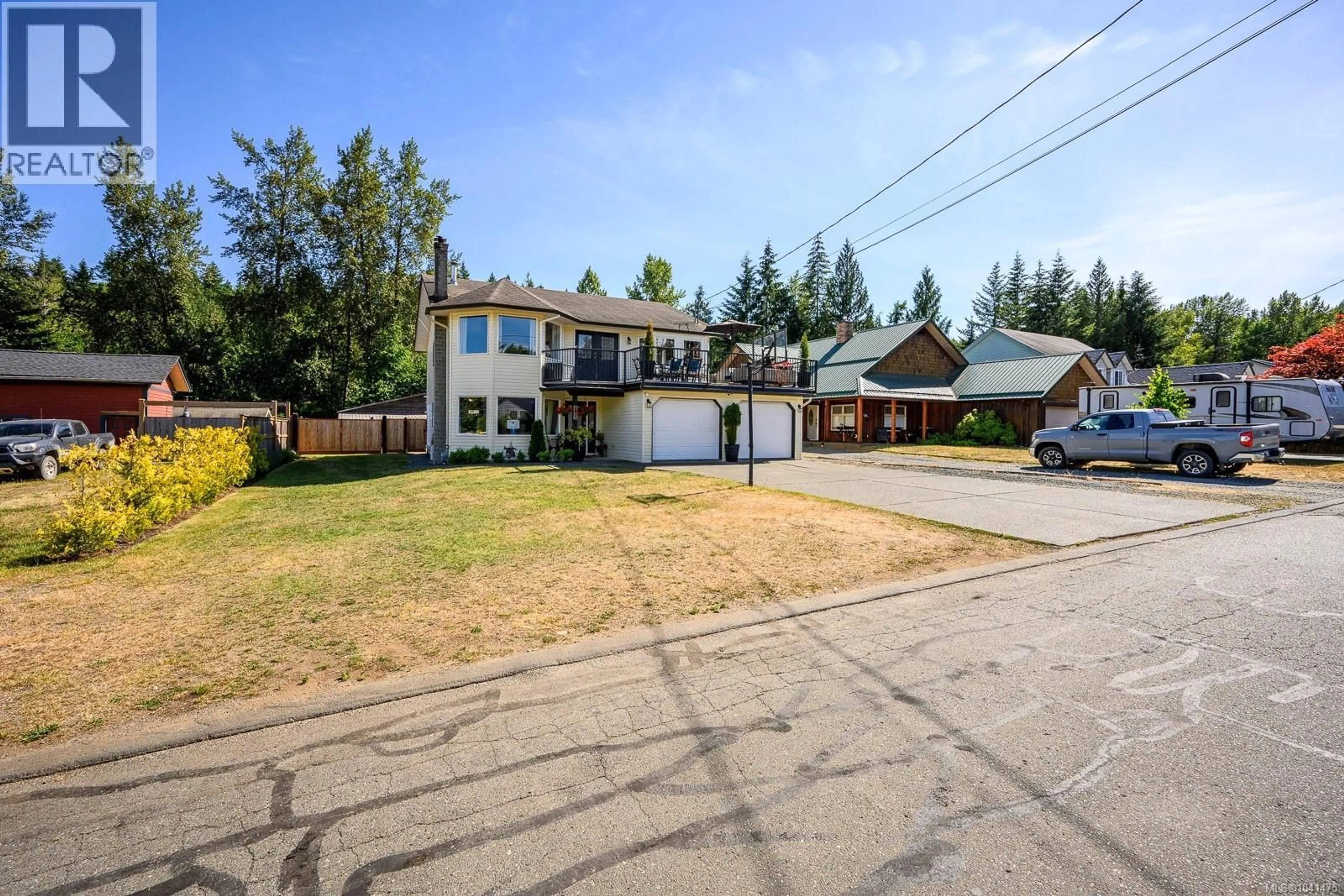 A pic from outside/outdoor area/front of a property/back of a property/a pic from drone, street for 2613 DERWENT AVENUE, Cumberland British Columbia V0R1S0