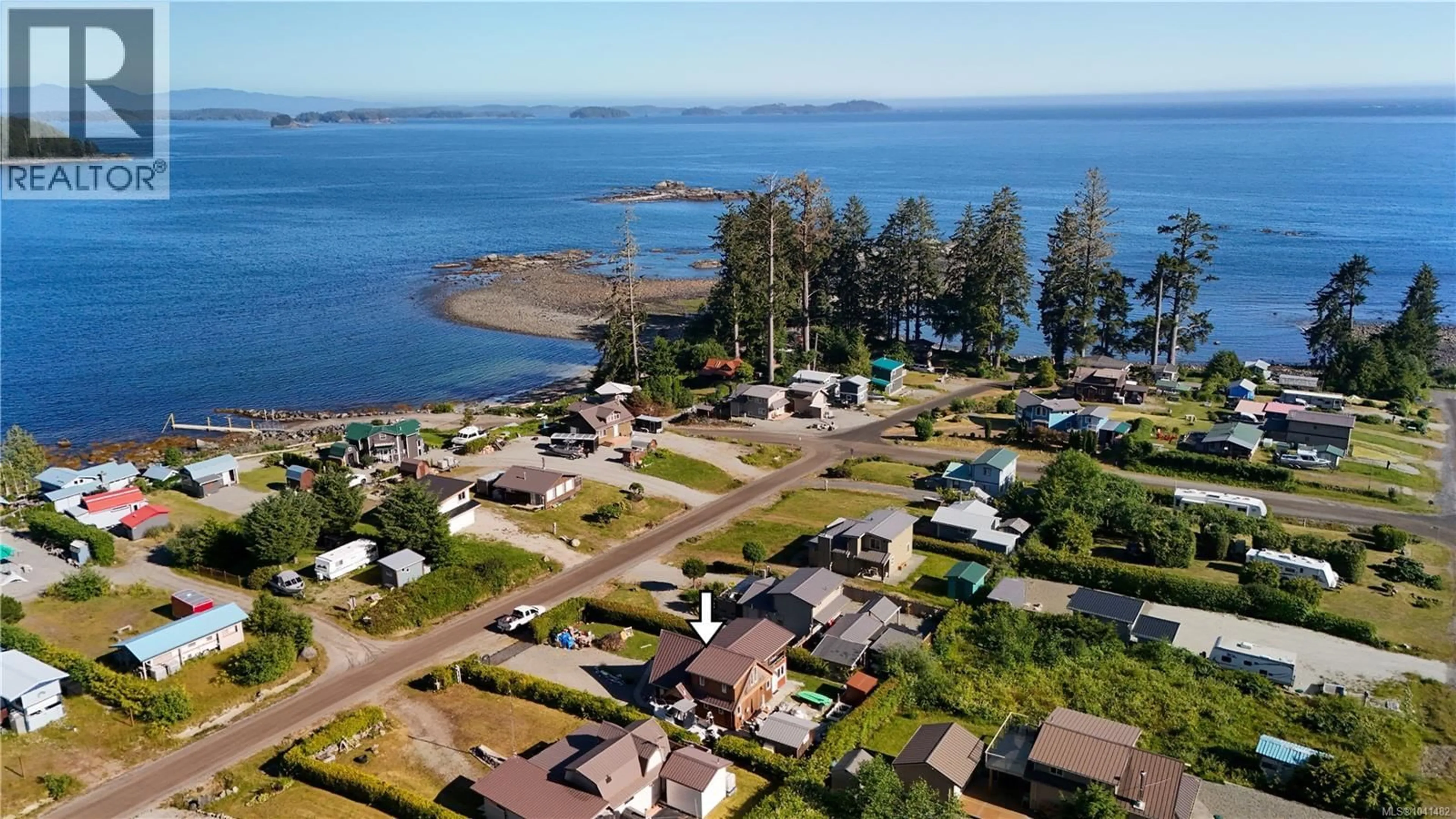A pic from outside/outdoor area/front of a property/back of a property/a pic from drone, water/lake/river/ocean view for 1049 SIXTH AVENUE, Ucluelet British Columbia V0R3A0