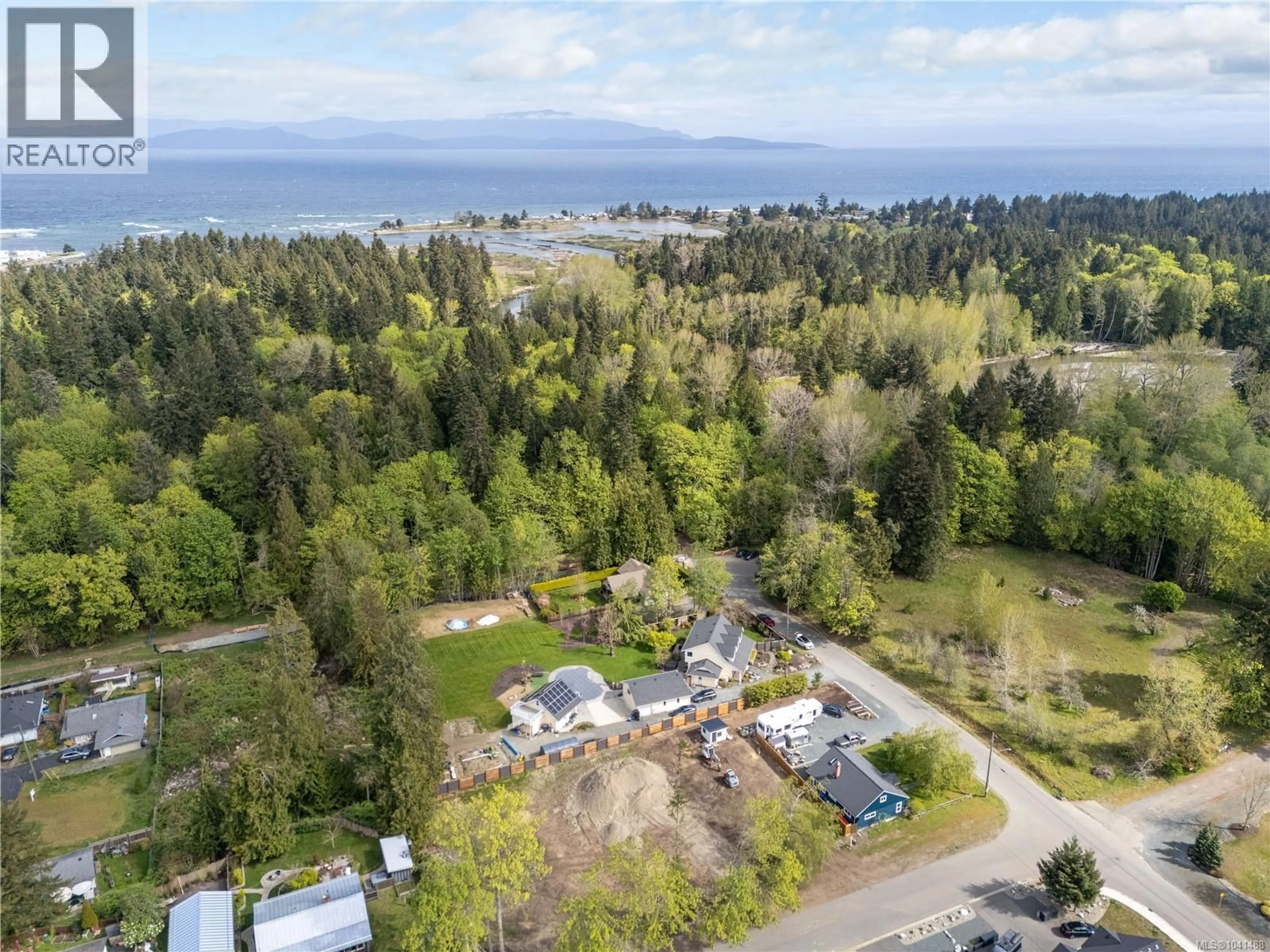 A pic from outside/outdoor area/front of a property/back of a property/a pic from drone, water/lake/river/ocean view for SLB1 - LOT B TULIP AVENUE, Parksville British Columbia V9P1T7