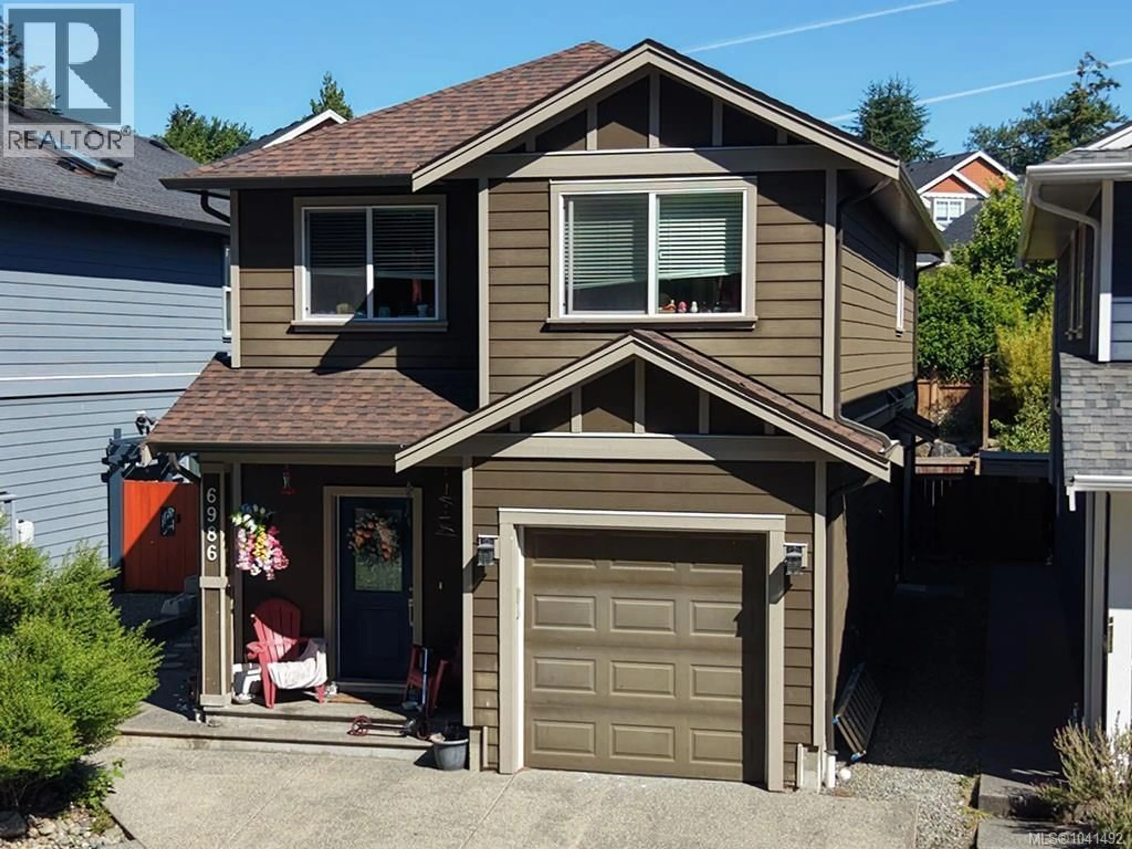Home with vinyl exterior material, street for 6986 WRIGHT ROAD, Sooke British Columbia V9Z1M5