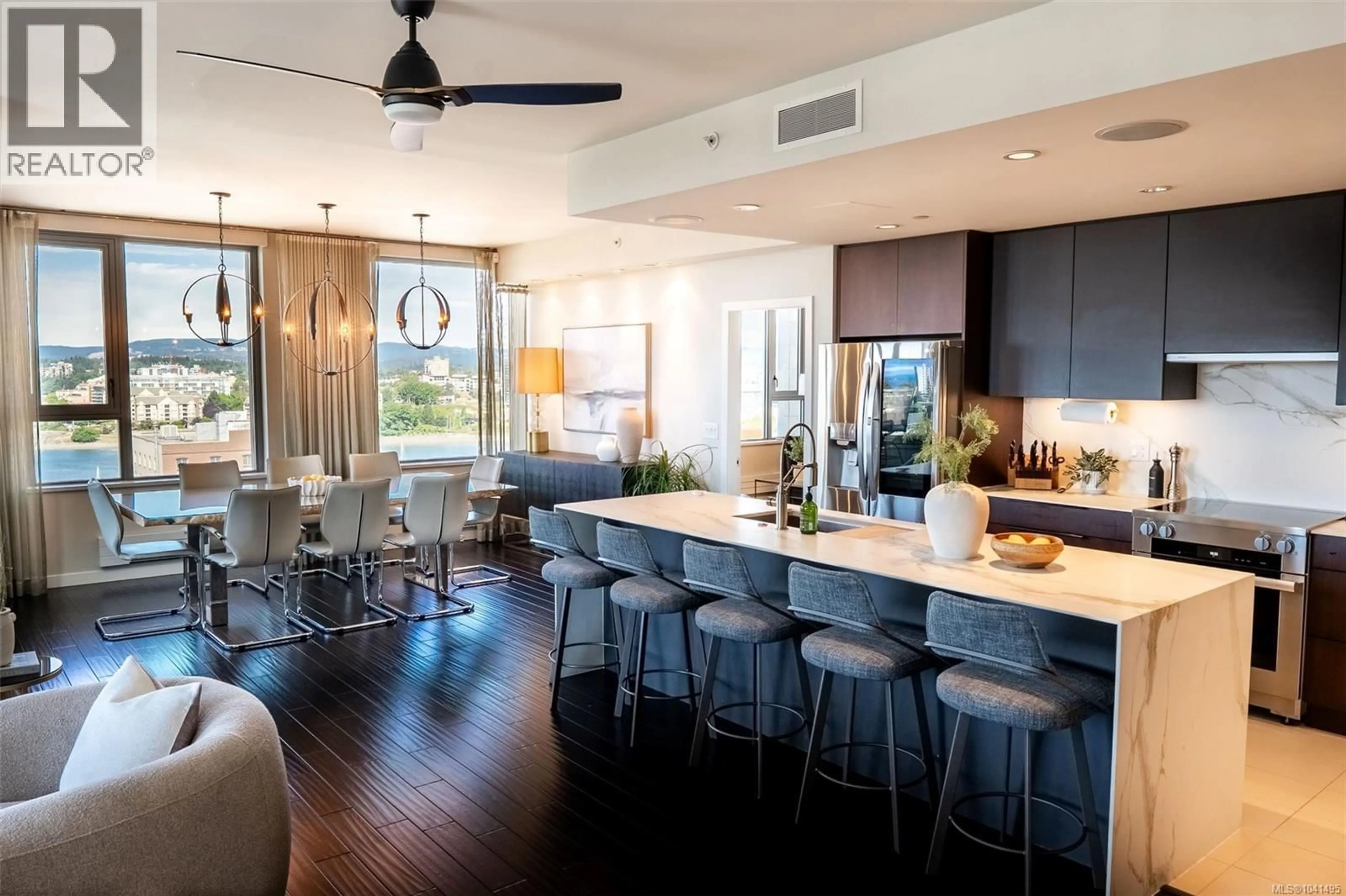 Open concept kitchen, wood/laminate floor for 1002 - 608 BROUGHTON STREET, Victoria British Columbia V8W1C7