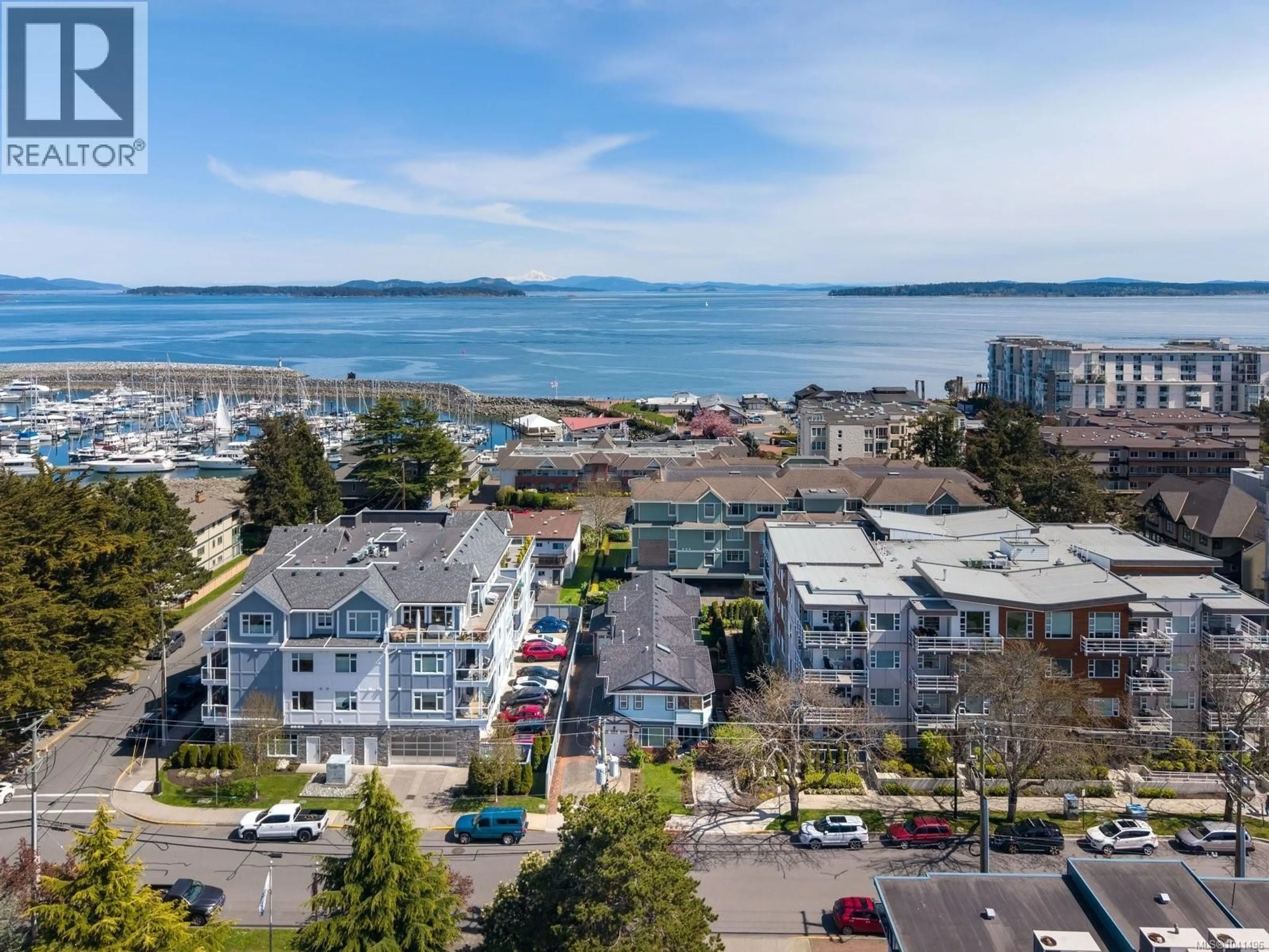 A pic from outside/outdoor area/front of a property/back of a property/a pic from drone, water/lake/river/ocean view for 1 - 9875 THIRD STREET, Sidney British Columbia V8L3A8
