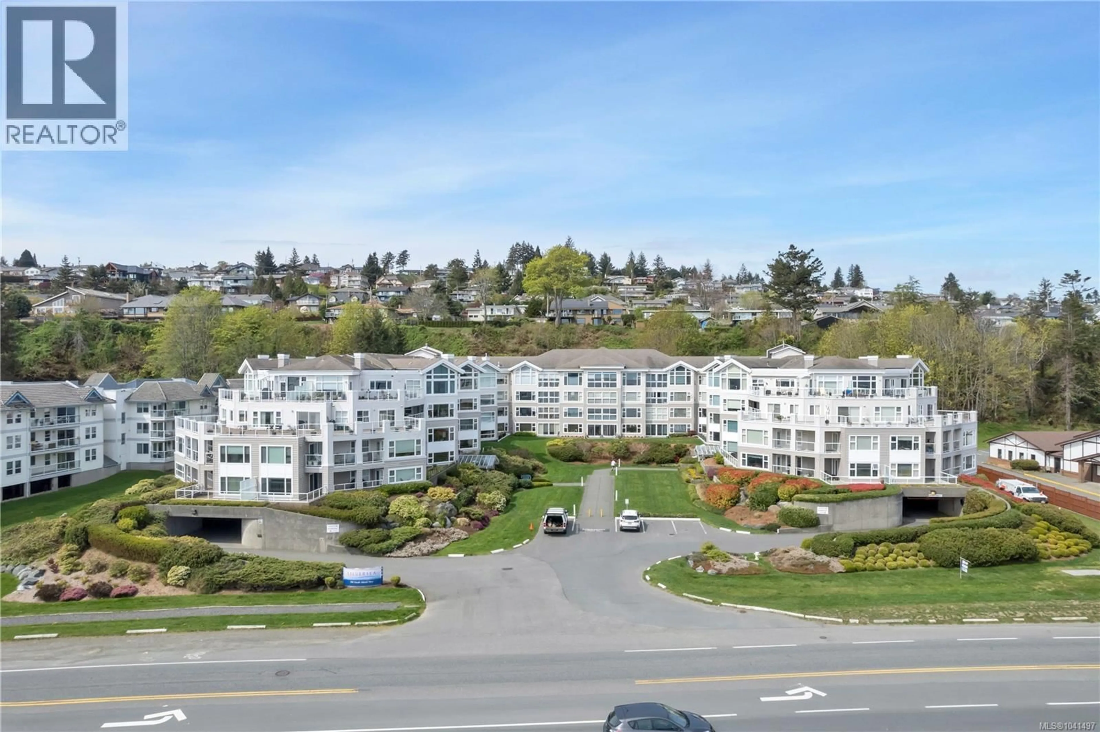 A pic from outside/outdoor area/front of a property/back of a property/a pic from drone, mountain view for 107 - 350 ISLAND HIGHWAY SOUTH, Campbell River British Columbia V9W1A5