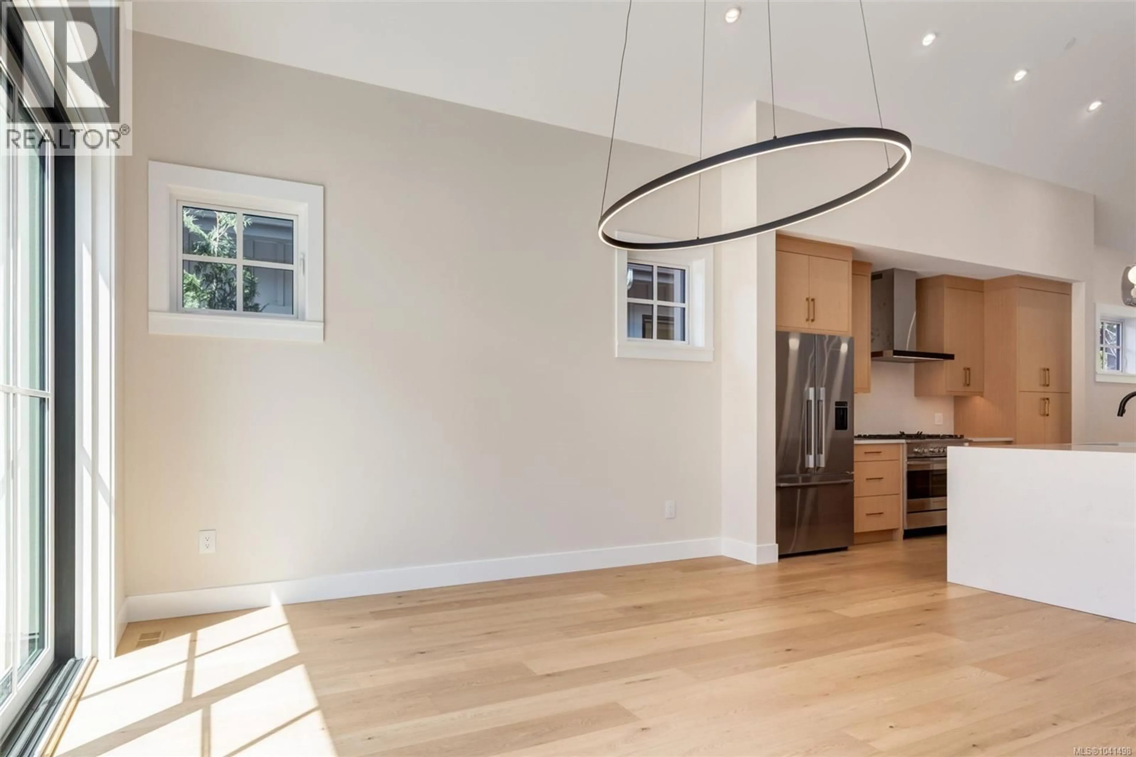 Open concept kitchen, wood/laminate floor for 513 HOLE-IN-ONE DRIVE, Qualicum Beach British Columbia V9K0B9