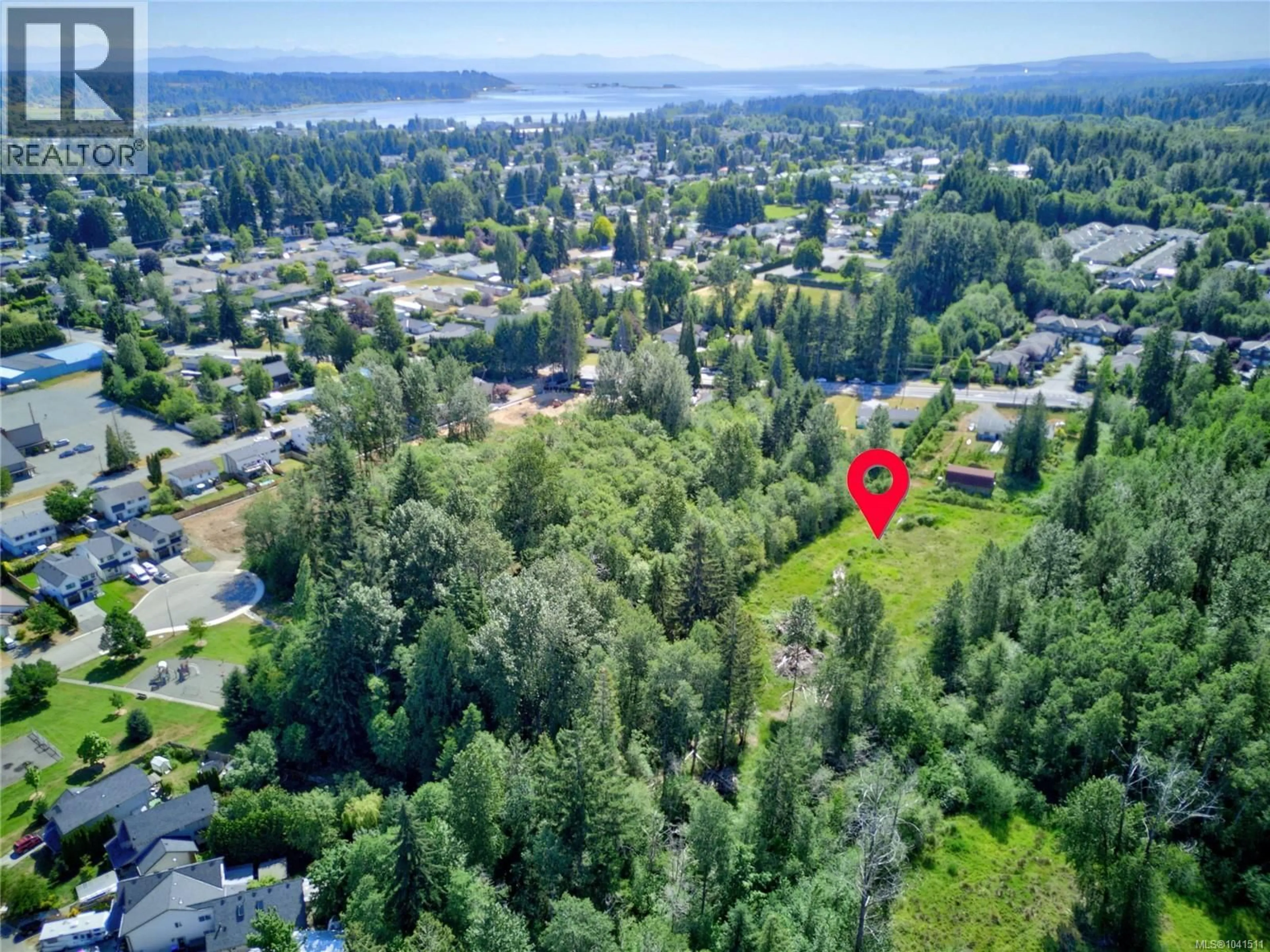 A pic from outside/outdoor area/front of a property/back of a property/a pic from drone, water/lake/river/ocean view for 2115 CUMBERLAND ROAD, Courtenay British Columbia V9N2G1