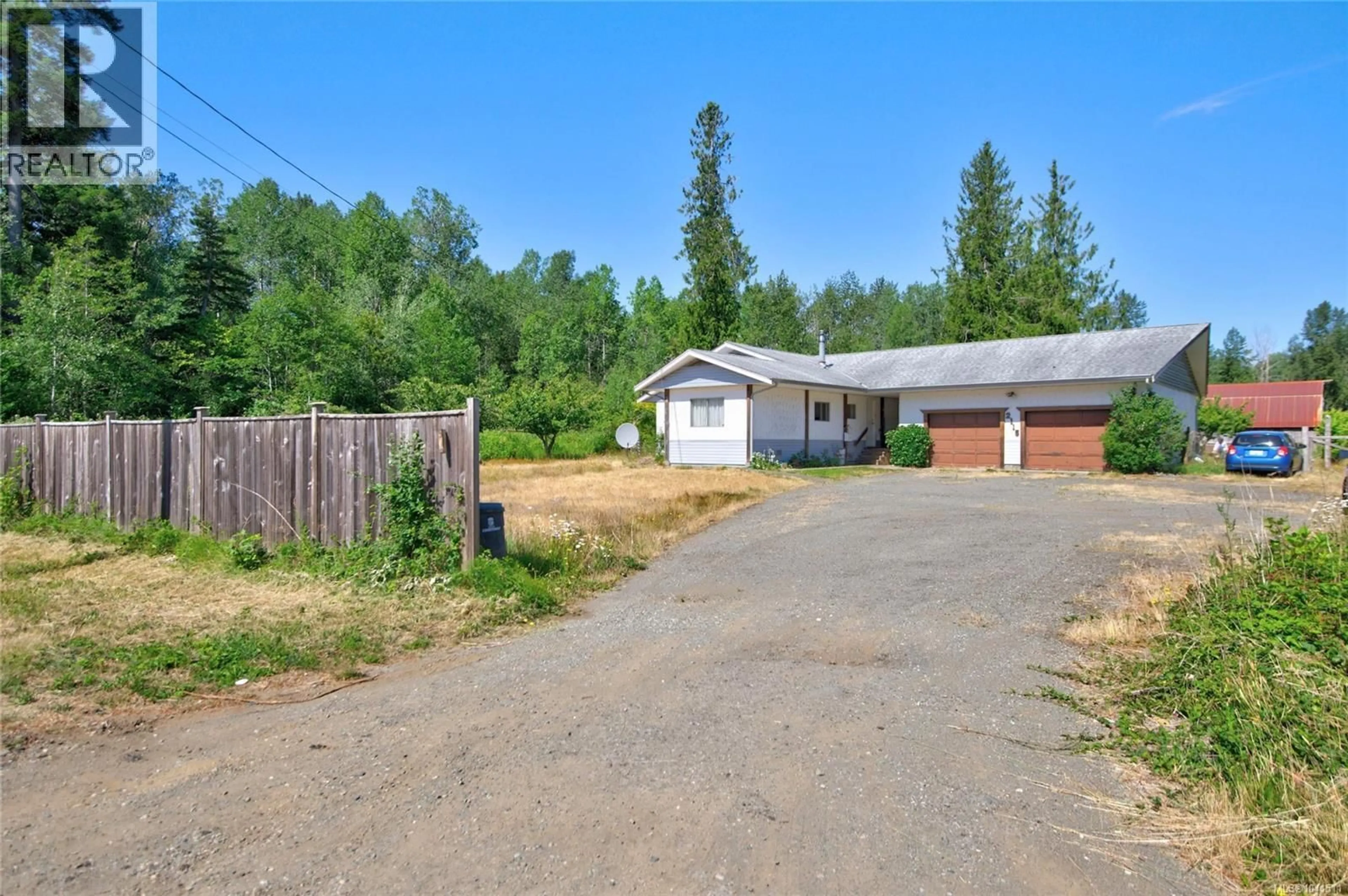 A pic from outside/outdoor area/front of a property/back of a property/a pic from drone, street for 2115 CUMBERLAND ROAD, Courtenay British Columbia V9N2G1