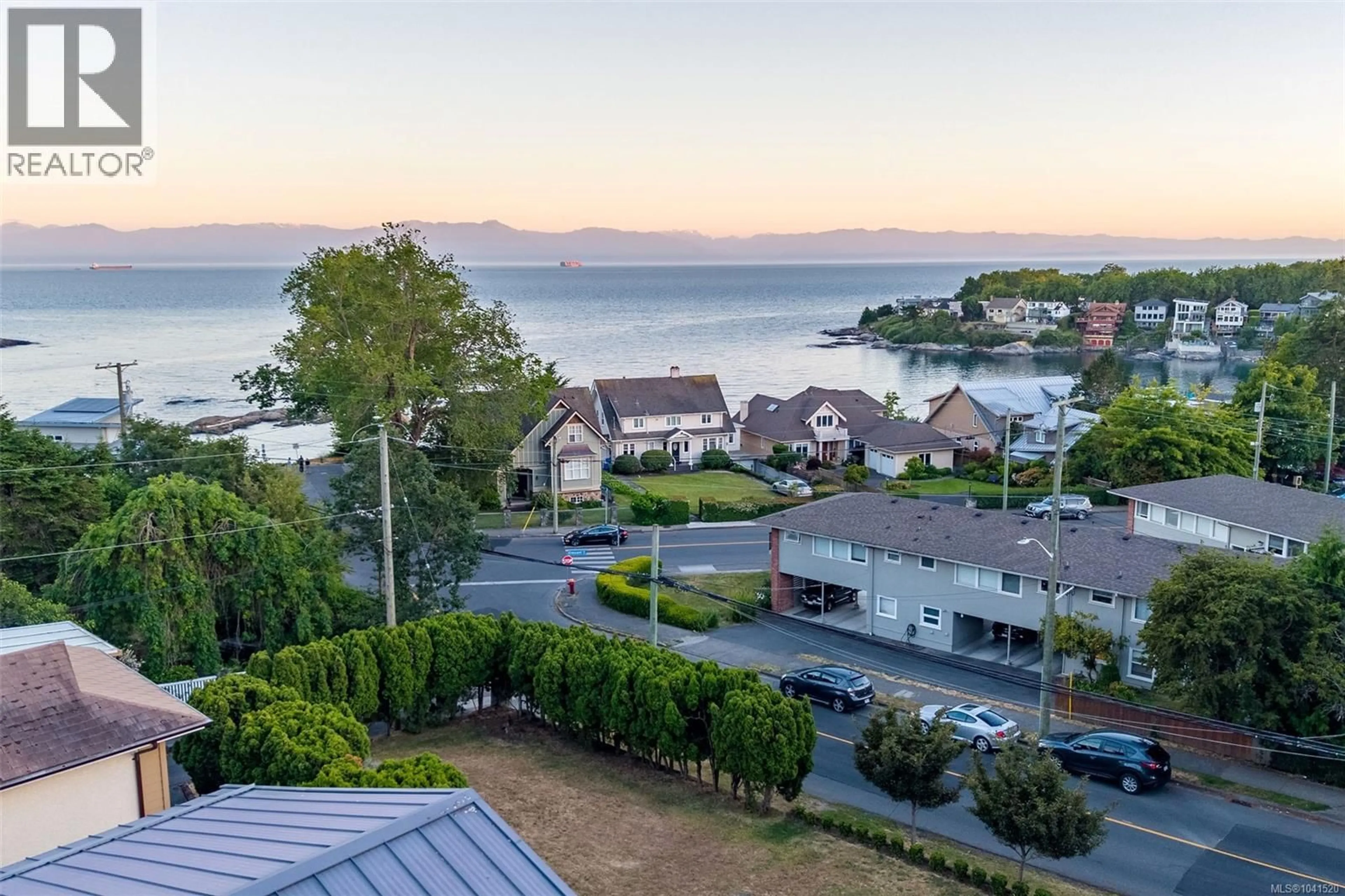 A pic from outside/outdoor area/front of a property/back of a property/a pic from drone, water/lake/river/ocean view for 321 FOUL BAY ROAD, Oak Bay British Columbia V8S4G6