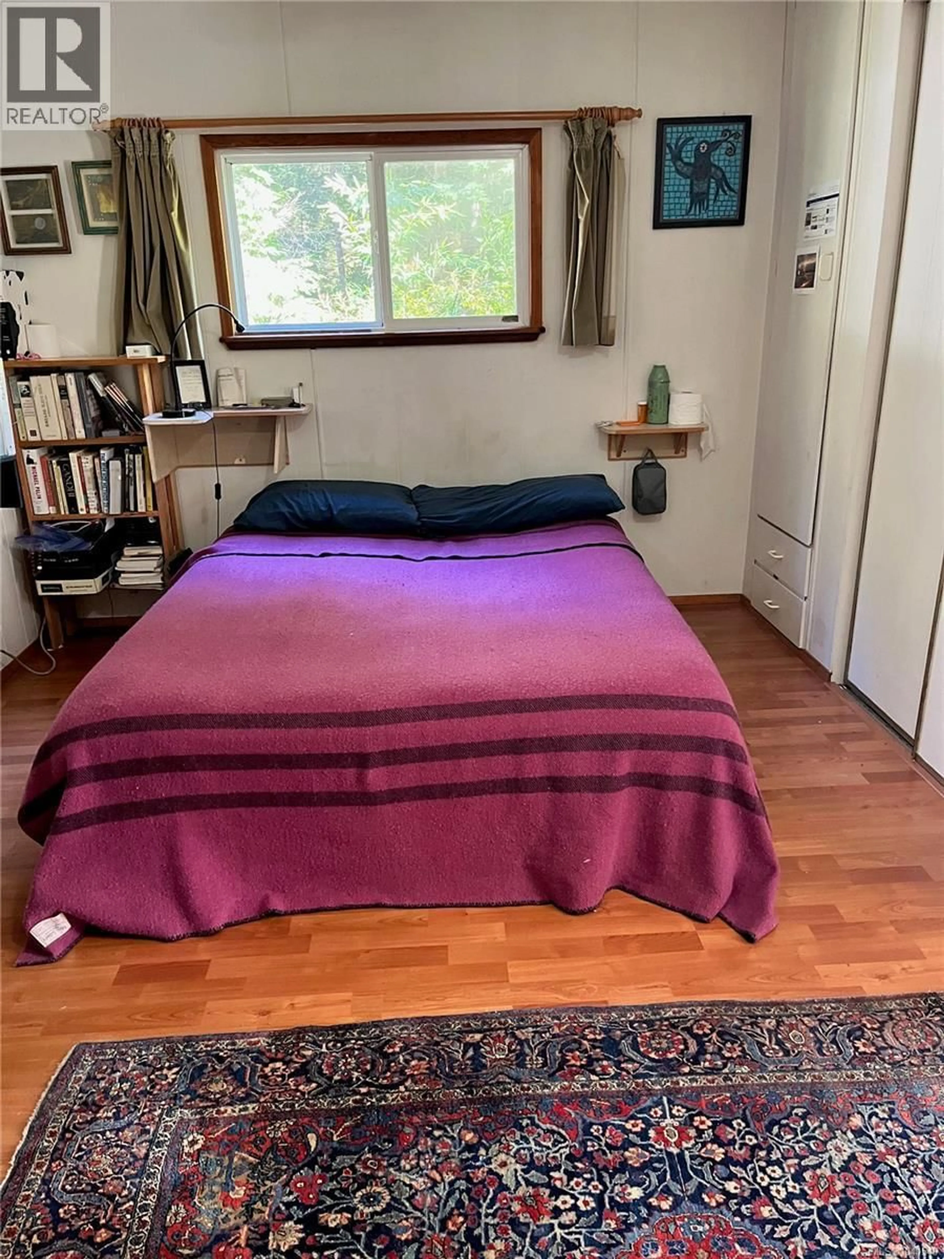 Bedroom with bed, floor is not visible for 323 SAWMILL ROAD, Cortes Island British Columbia V0P1Z0