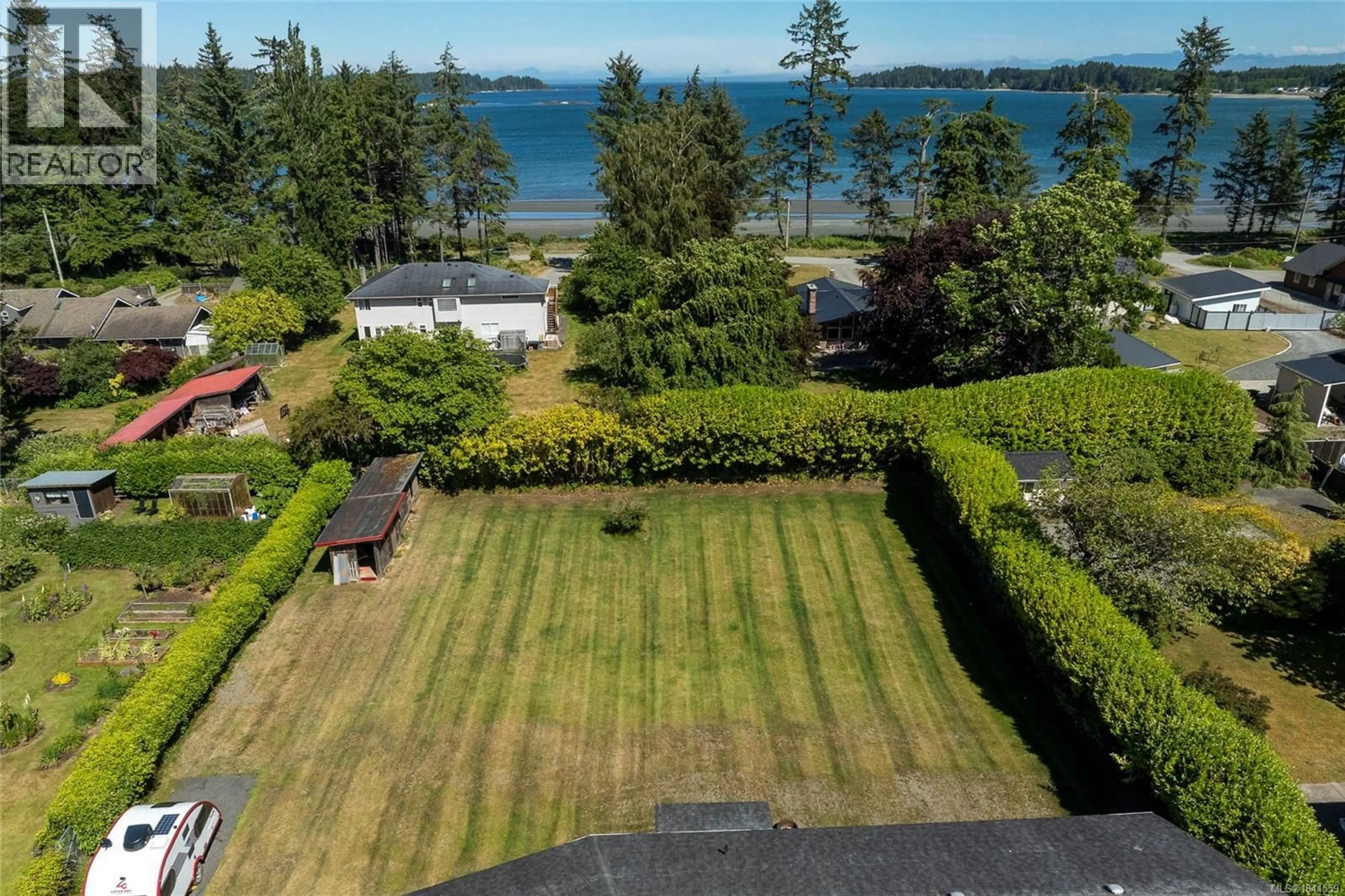 A pic from outside/outdoor area/front of a property/back of a property/a pic from drone, water/lake/river/ocean view for 6095 BEAVER HARBOUR ROAD, Port Hardy British Columbia V0N2P0