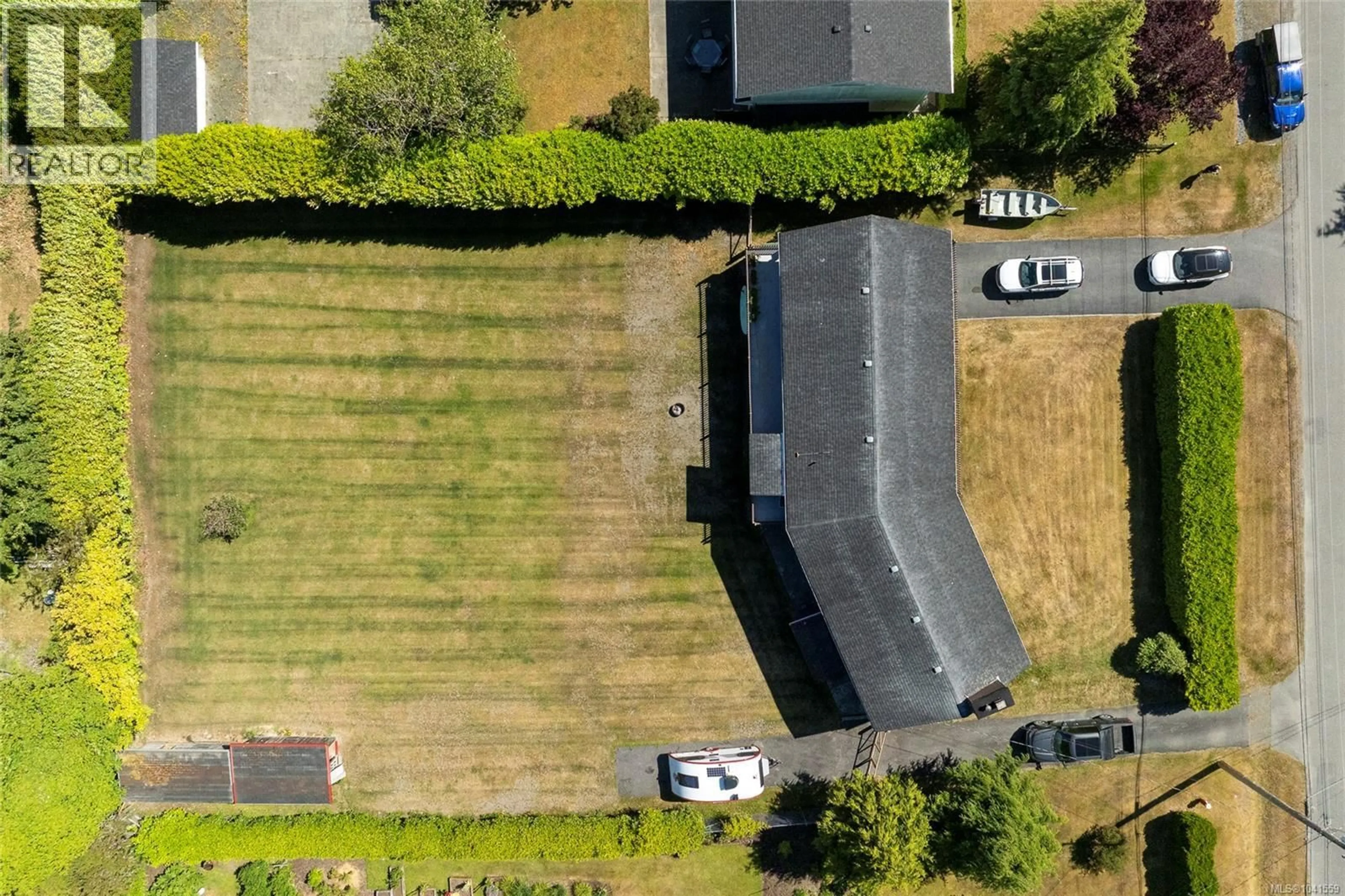 A pic from outside/outdoor area/front of a property/back of a property/a pic from drone, street for 6095 BEAVER HARBOUR ROAD, Port Hardy British Columbia V0N2P0