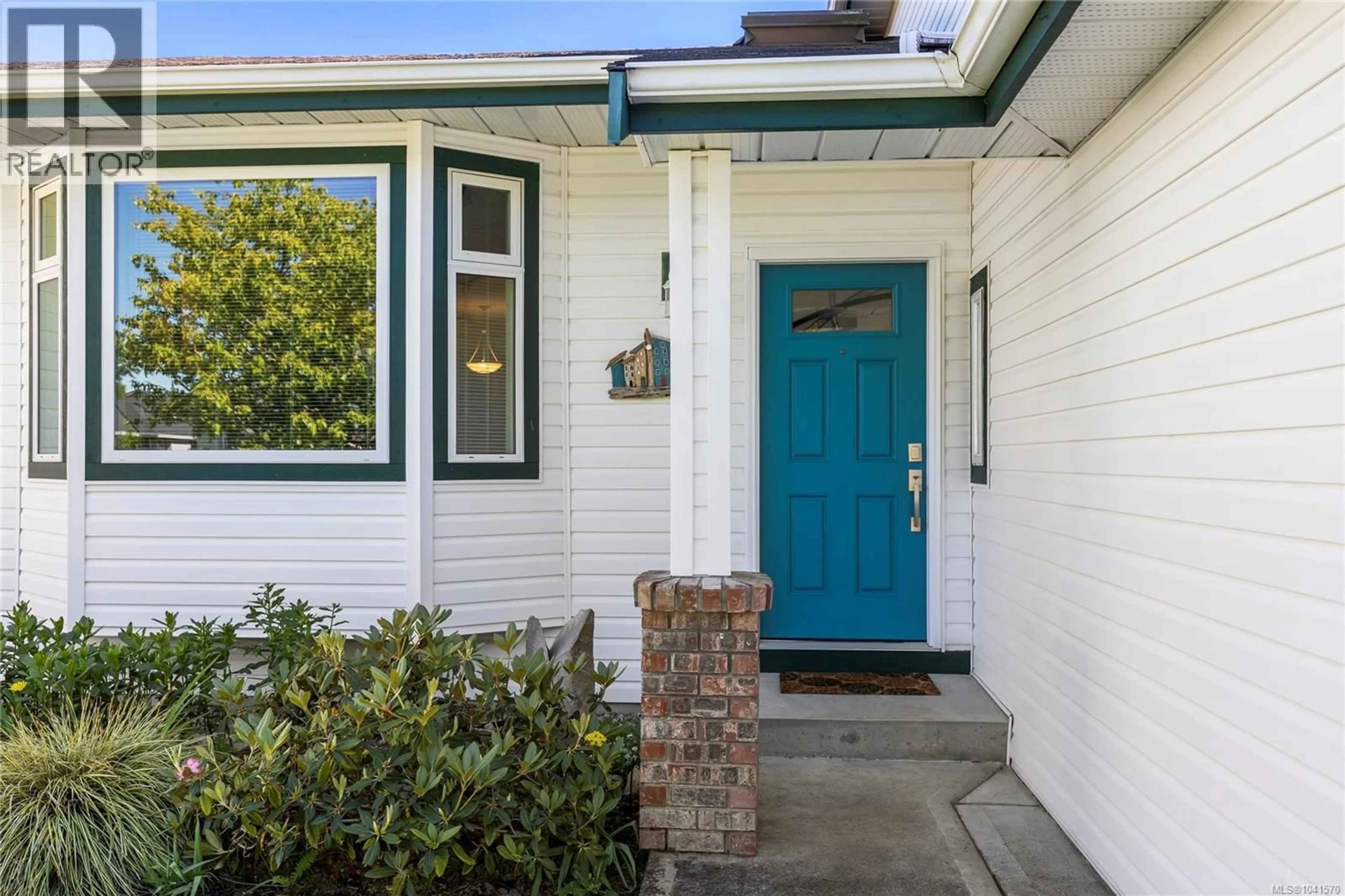 Home with vinyl exterior material, street for 5979 DEVON PLACE, Nanaimo British Columbia V9V1E1