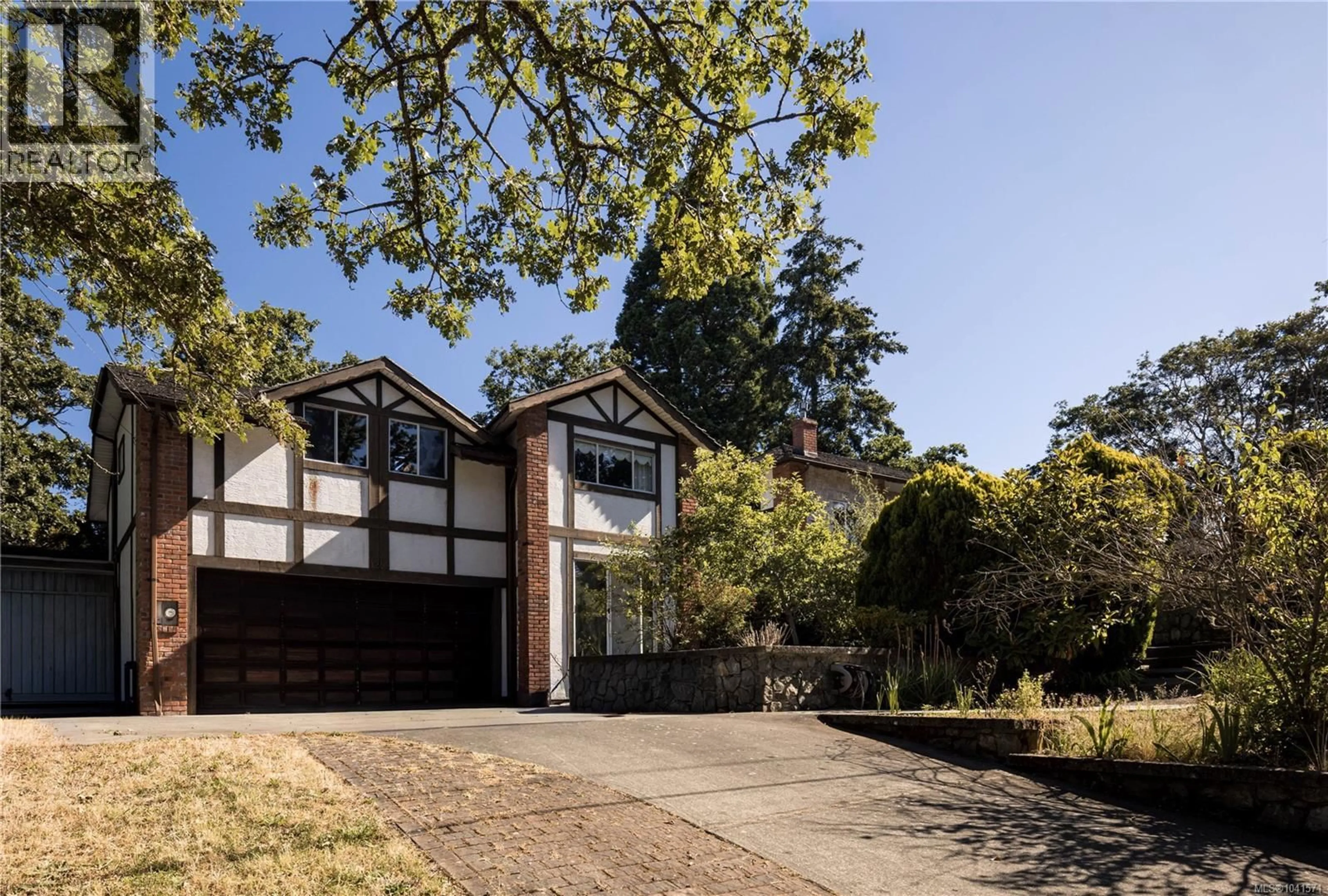 Home with brick exterior material, street for 1296 ASTORIA ROAD, Saanich British Columbia V8P1W1