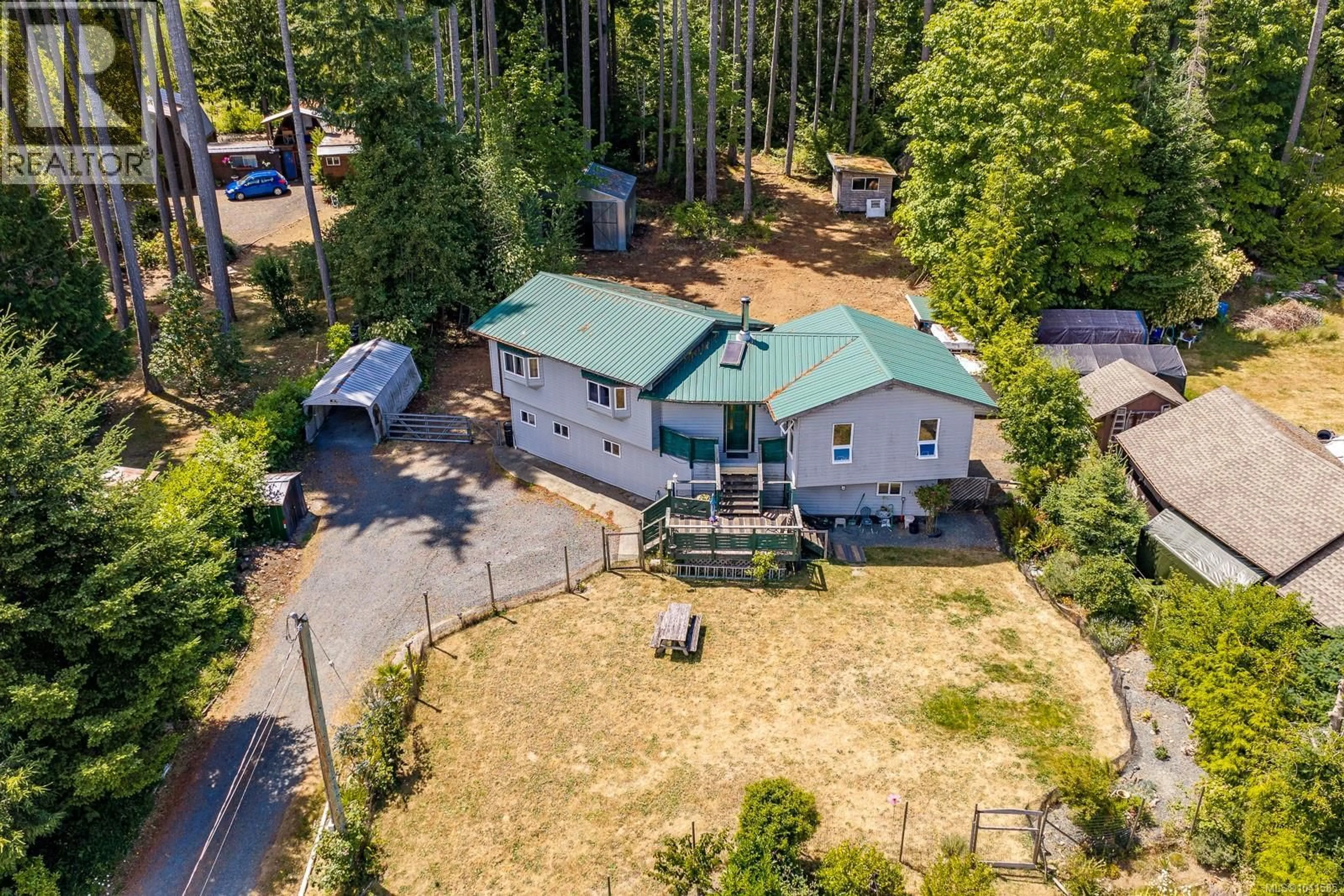 A pic from outside/outdoor area/front of a property/back of a property/a pic from drone, unknown for 4530 THOMPSON CLARKE DRIVE EAST, Bowser British Columbia V0R1G0